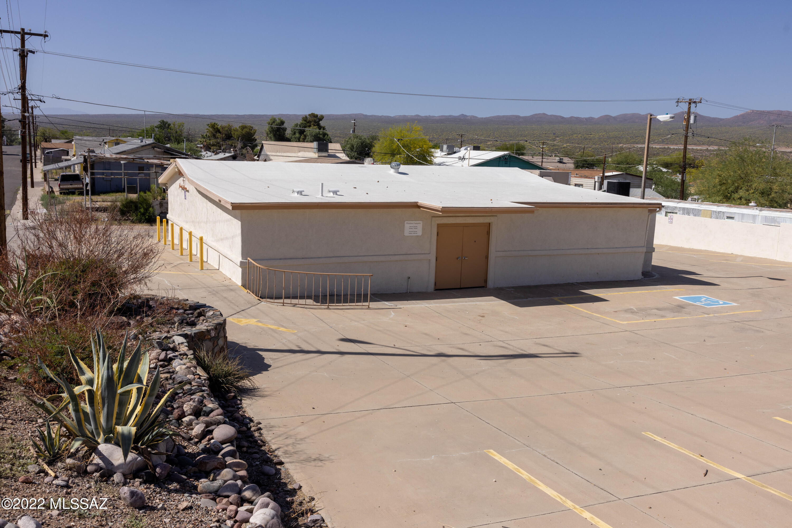 Well maintained building previously used as church.  Property has a main auditorium, separate office/library, storage and two restrooms.  Tiled entry and tiled restrooms.
