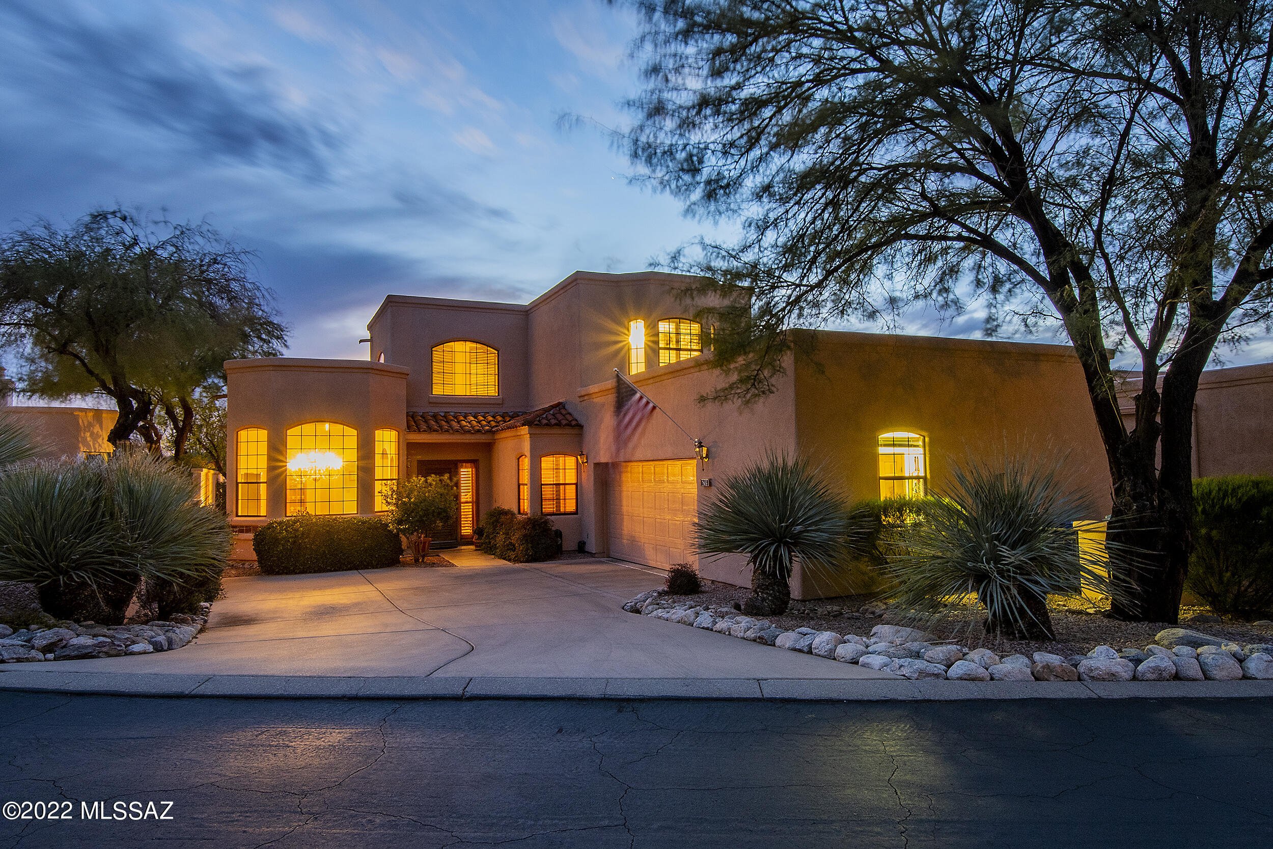 Living in La Paloma on a private Cul-de-Sac with views of the golf course, city and Mountains. This Mediterranean style 2 story home has a south facing back yard overlooking the La Paloma golf course and city lights. Walk into a breath taking 2 story entry hall. Formal Living Room with wood burning fireplace. Large Family Room with fireplace that opens onto the covered patio thru French doors. Plus a large formal Dining Room. Huge Kitchen featuring a large island for incredible cooking opportunities that opens onto a large Breakfast room that also leads out to the back yard. There are 2 bedrooms and 1 1/2 baths on the 1st floor. Upstairs is a large Master Retreat with wood burning fireplace and a door leading to upstairs balcony over looking the golf course. Plus a 4th bedroom/office The 2 car garage has extra storage plus a huge storage area that could be used as an artist studio or craft room. the back yard has a covered patio plus a brick viewing patio overlooking the golf course plus an outdoor grill and fountain. When using the VR tour, for 2nd floor click on fllor selection on lower left hand corner