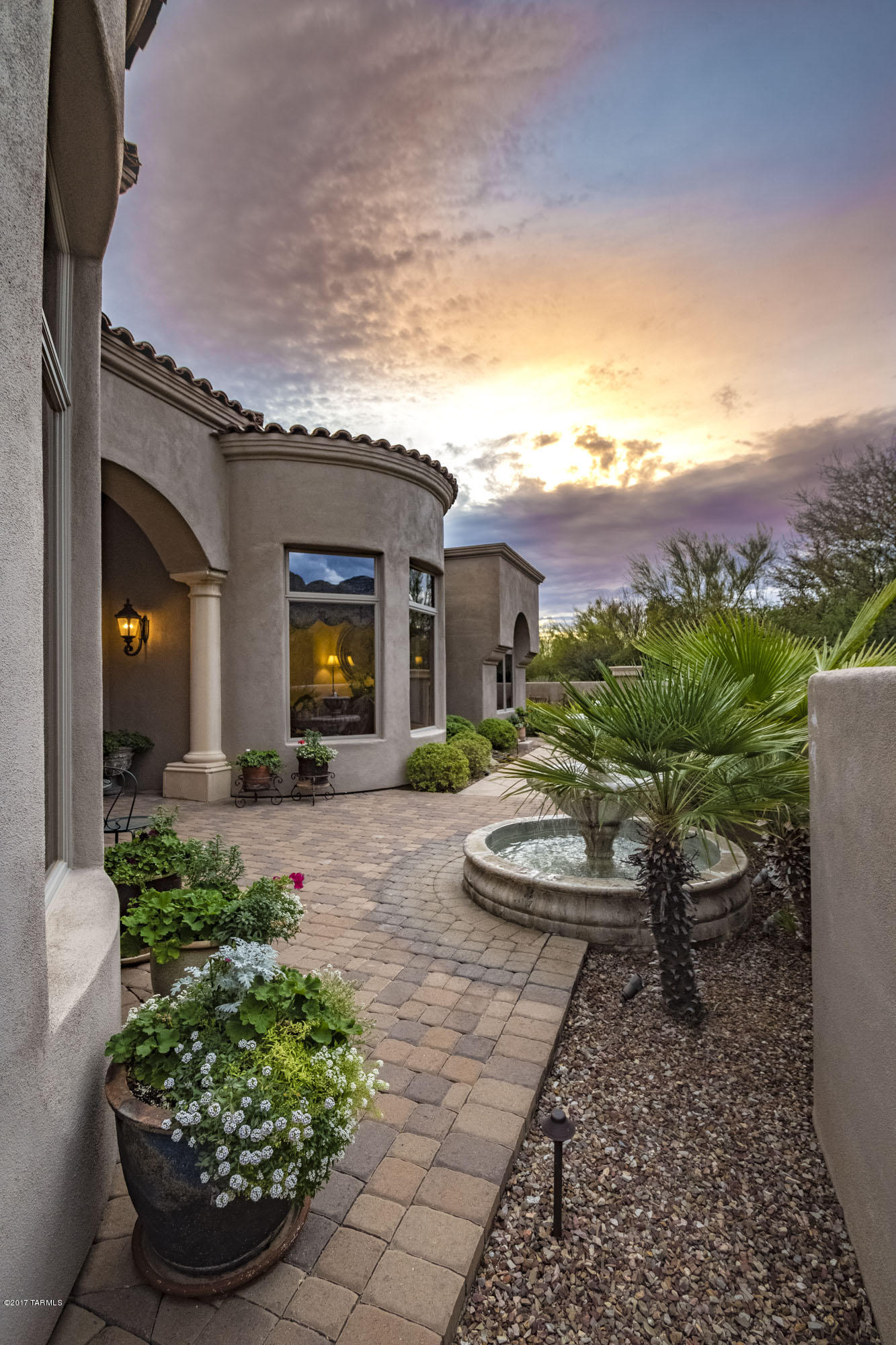 Stunning Mediterranean with city & mountain views thruout every window!Gourmet kitchen including pot-filler, warming drawer, and huge island-great for gatherings!separate butler's pantry,bar,office,walk-in pantry,over-size laundry,central vac are a delight!Deep back patio with fireplace and barbeque capture city lights. Large bedrooms with walk-in closets and private baths provide elegance and privacy too.