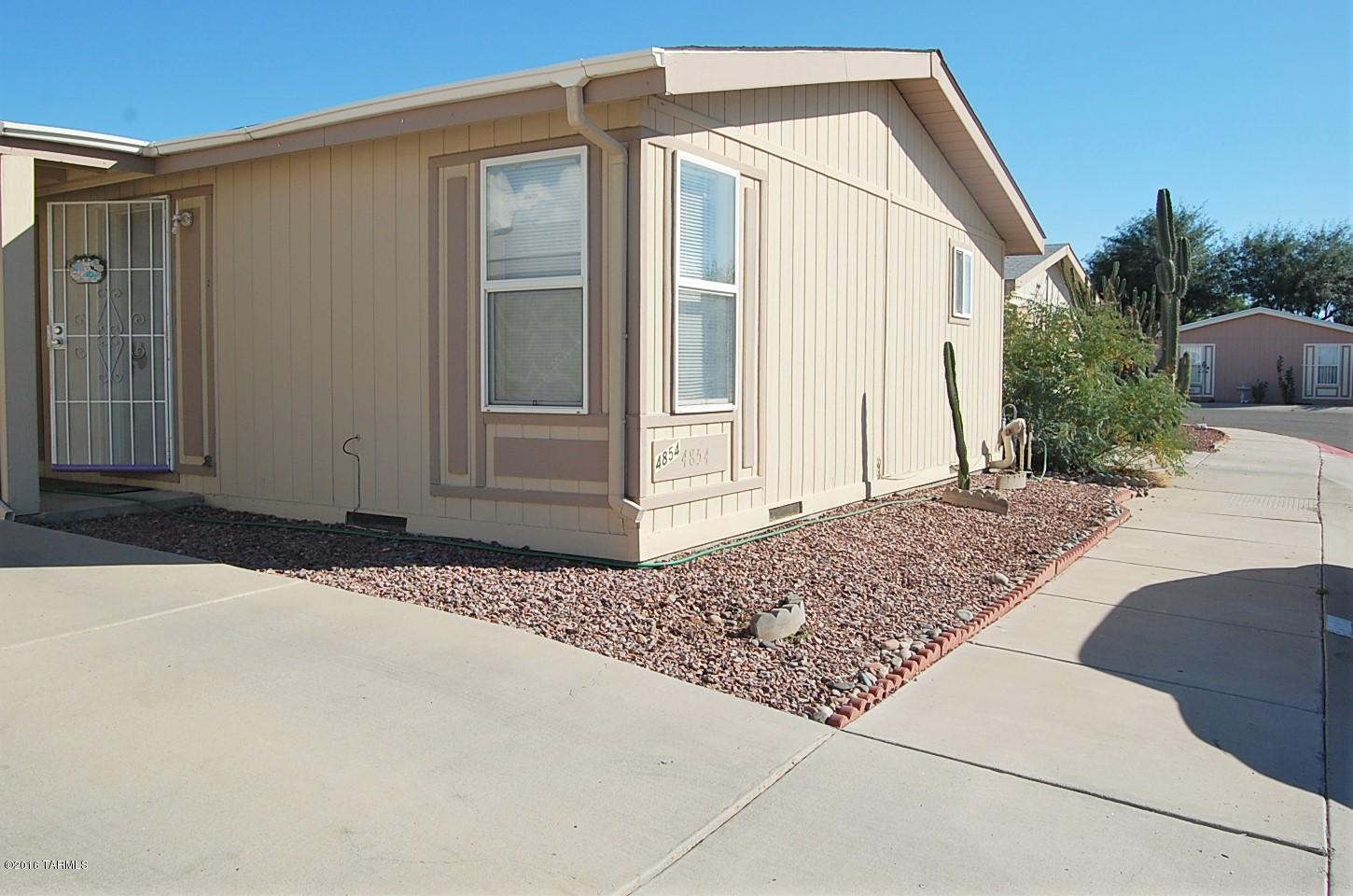 Very clean and well maintained home in the quiet subdivision of River Point.  Centrally located, this 4 bedroom 2 bathroom home has beautiful laminate flooring, an open floor plan including formal and informal living areas. The master bedroom has an on suite and walk in closet. The 3 other bedrooms are good sized and each have a closet. The laundry room is off the kitchen and provides for more storage. The home includes a storage shed out back and yard with  easy low care landscaping. This home is conveniently located, close to shopping and schools. The Riverwalk trail is with in walking distance. This home is move in ready. Come see it today!