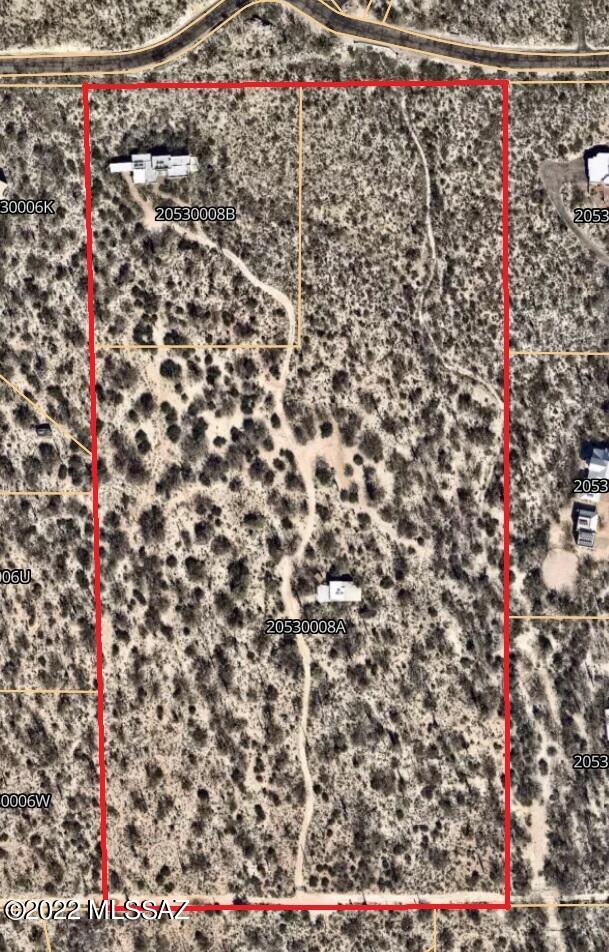Great neighborhood, beautiful desert and riparian vegetation. This fabulous SR zoned 20+ acres of Horse Property is subdividable into 6 Suburban Ranch zoned lots for home plus guest house development on each, or a family compound, or a small hotel unsubdivided or other allowed SR uses.
Excellent mostly flat topography. All utilities (except city sewer) are either within the property (serving the home) or at property line (in the case of gas and cable). Includes a well-maintained 3 bedroom, 2 full bath territorial style block/stucco/plaster home with excellent views and many green features. Also includes a separate newer office/greenhouse building with ¾ bath and wired 220 for kitchen or shop.