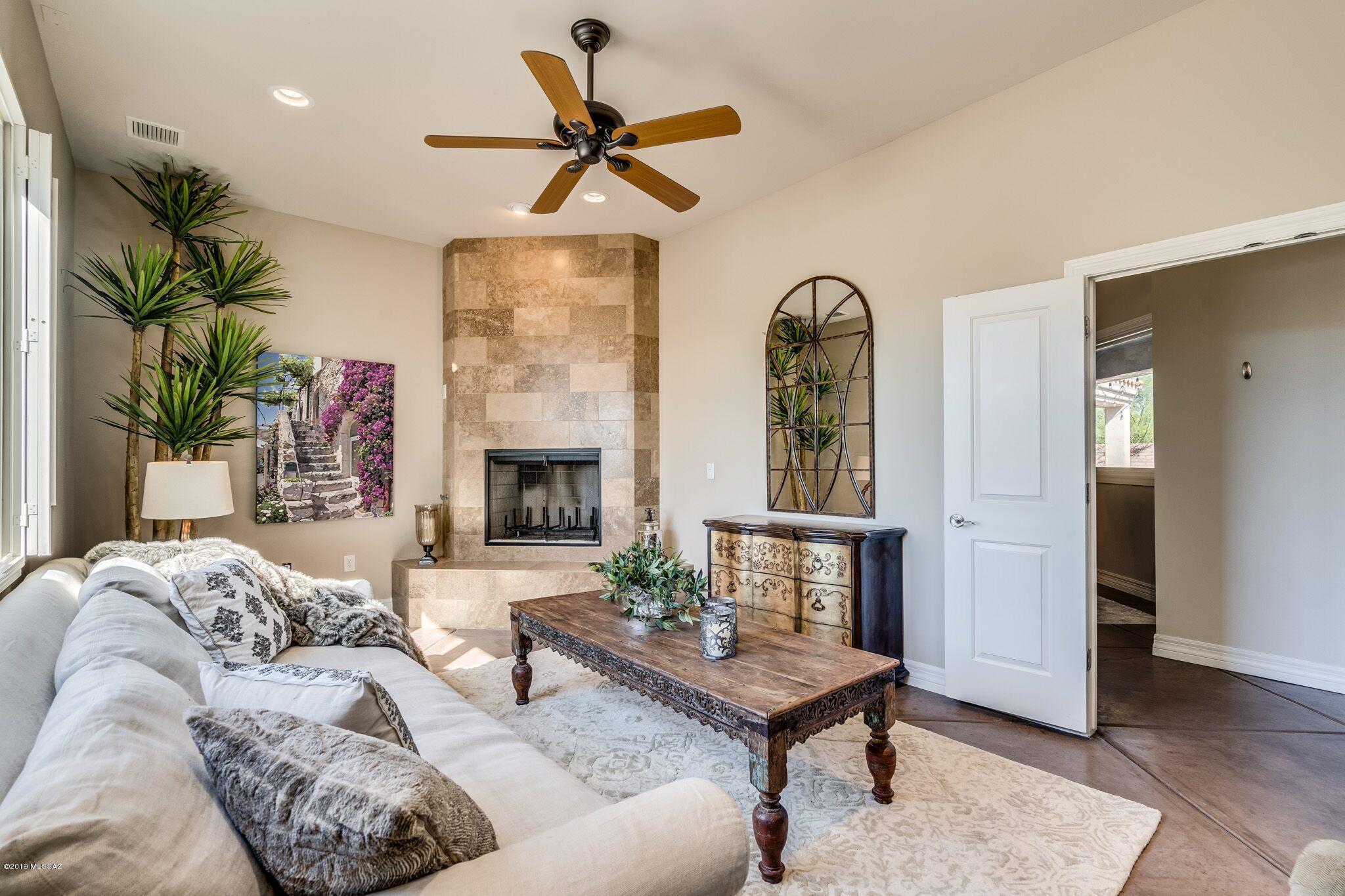 Beautiful custom home that has the space you need! gourmet kitchen, scored concrete floors, extra large master bath with His/Her vanities and closets. Guest Wing, Expansive covered patio space and Pella tinted windows/doors. Solar is owned and Seller's monthly bills are approx. $19,00/month. Newer HVAC units. Gorgeous pool with mountain views. large 3-car garage with storage.