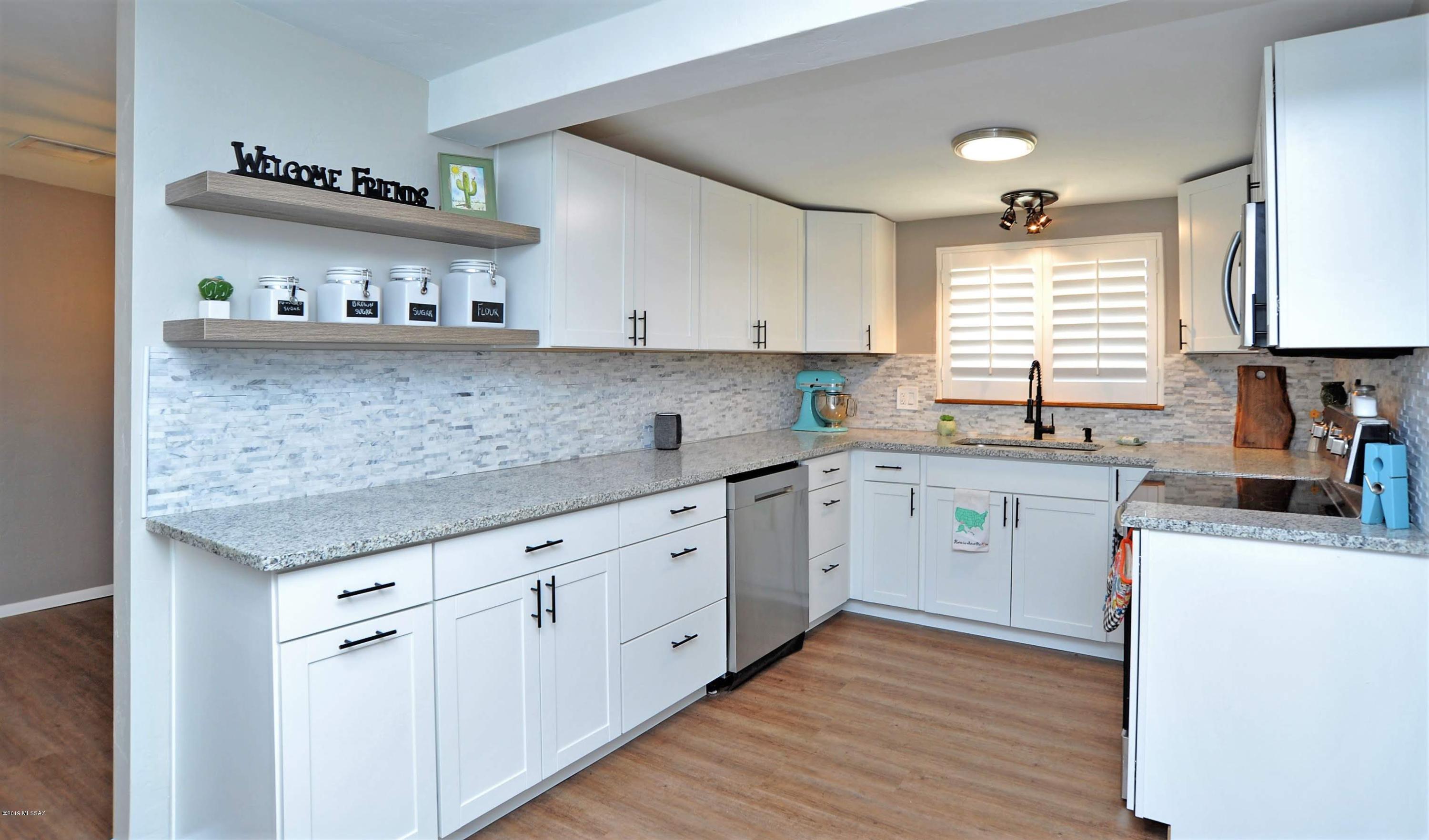 Lovingly renovated and charming brick ranch home conveniently located across the street from Hendricks Elementary, close to I-10, shopping and entertainment.  Long list of improvements! See Photos, SPDS and call agent.    Agent related to sellers.