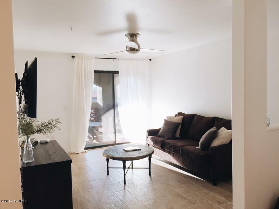 Totally epic second floor furnished condo! Nicely updated with ''wood tile'' floors throughout, granite in kitchen and bathroom as well as updated cabinets. Breakfast bar in kitchen is dropped making the kitchen open as well as providing additional prep space. Rental rates vary with time of year and length of stay. Price shown is Summer rate. One month minimum.