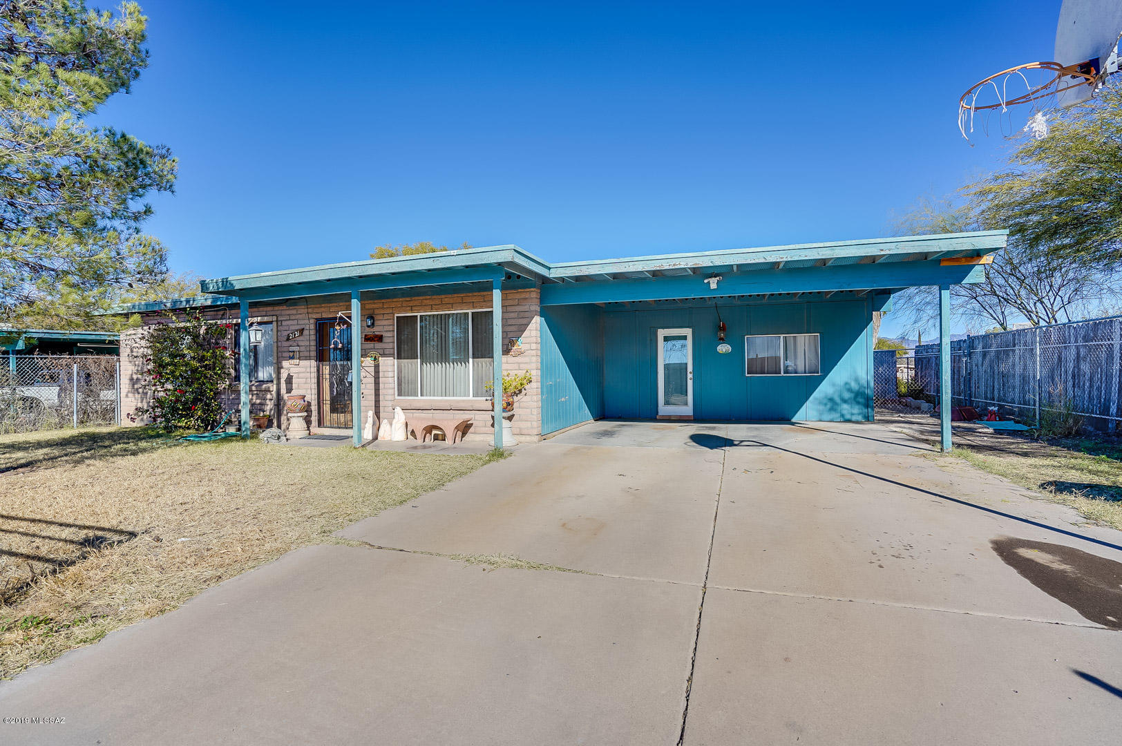 Great Opportunity! This 980 sq ft home with additional 300 sqft (approx) can be yours! The storage room was expanded to creat the Family Room.  Large yard with citrus tree and amazing custom BBQ. This home is in need of TLC which allows you to personalize every room! Hot water heater 2018 and furnace was replaced in 2016. Priced to sell!