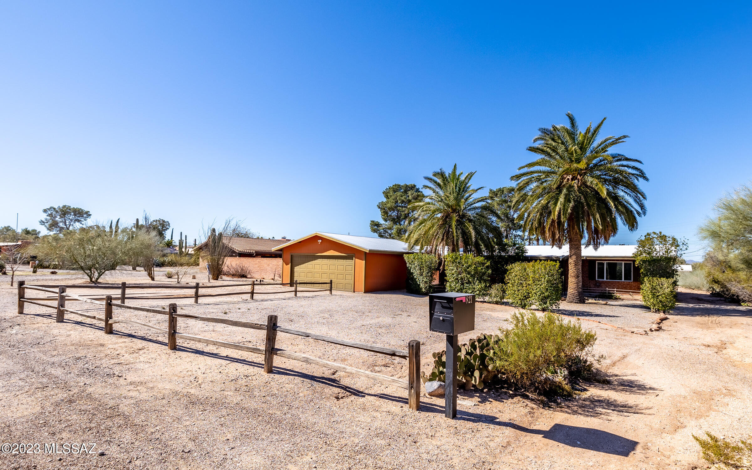 Totally renovated spacious ranch home nestled in the heart of this convenient estate neighborhood with homes on large lots. Updated floors, kitchen, bathrooms, paint, fixtures & ceiling fans. Newer stove, refrigerator,  microwave, DW, washer/dryer etc Porcelain Tile floors in all rooms! Living Room w/flagstone wood burning fireplace. Formal Dining room plus eat-in kitchen. Large AZ Room makes wonderful den or office. Huge 20x20 Rec Room. 2 car garage. Private yard with covered patio. Large half acre lot. Close to shopping, parks, schools, medical facilities, etc. Library & hospitals nearby.