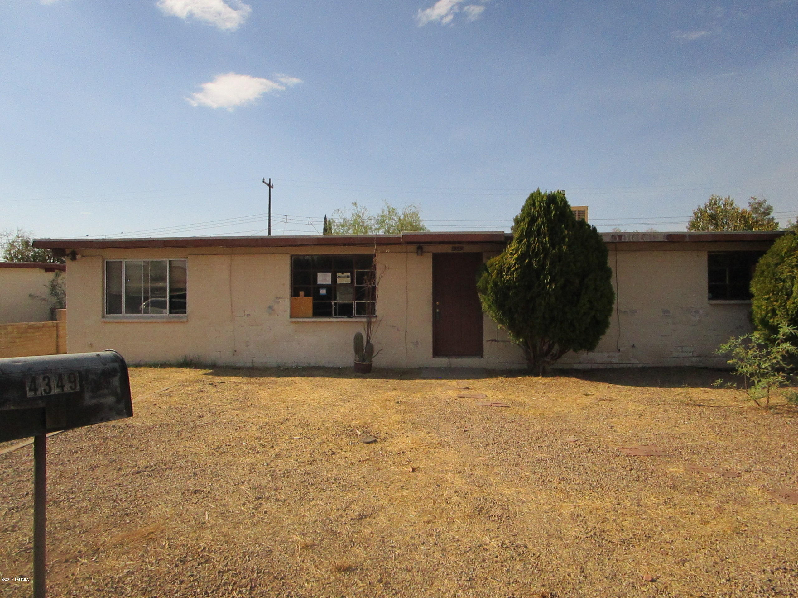 REO Properties are sold AS-IS. Listing Broker and Seller assume no responsibility and make no guarantees, warranties (expressed or implied) or representations as to the availability or accuracy of information contained herein. This is a fix-up property with 4 bedrooms (1 bedroom is an enclosed carport with separate entry). Living room, bright open kitchen with skylight and family room just off kitchen. This house has 2 full bathrooms and a half bathroom off the master bedroom. Covered Patio, private & spacious backyard with block fence, trees, space for RV, toys, gardens, etc. Centrally located and convenient to schools, shopping, parks, and entertainment! Water and electric are on, interior gas line needs repair. Property will not qualify for government financing in its current condition.