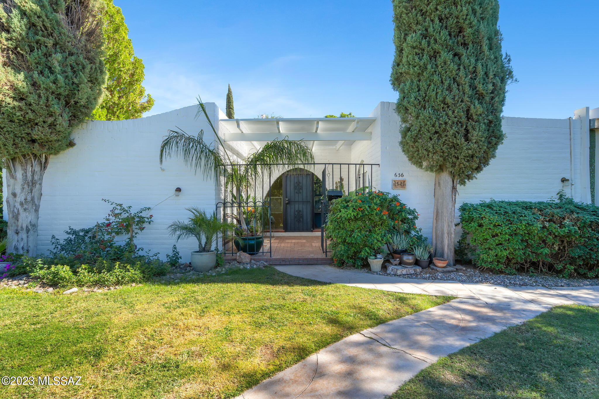 A unique oasis in the desert awaits the new owner of this special condo. Designed by world renowned architect Bennie Gonzales, this is a National Historic Designated community. A residential community of 120 homes for adults 55+, that is surrounded by 17 acres of mature trees and vegetation in a park-like atmosphere. 3 bedrooms, 2 bathrooms and 1,557 sq ft with one covered parking spot. Natural burnt adobe walls, wood beams, travertine stone & wood floors, skylights and arching windows from ceiling to floor. Atrium with fountain is the heart of this home. Casita de Castilian is just north of Tucson in the foothills off Oracle Road. It is near shops, restaurants, medical facilities and the Tucson Mall. Community features tennis courts, two swimming pools, clubhouse, palm and citrus trees.