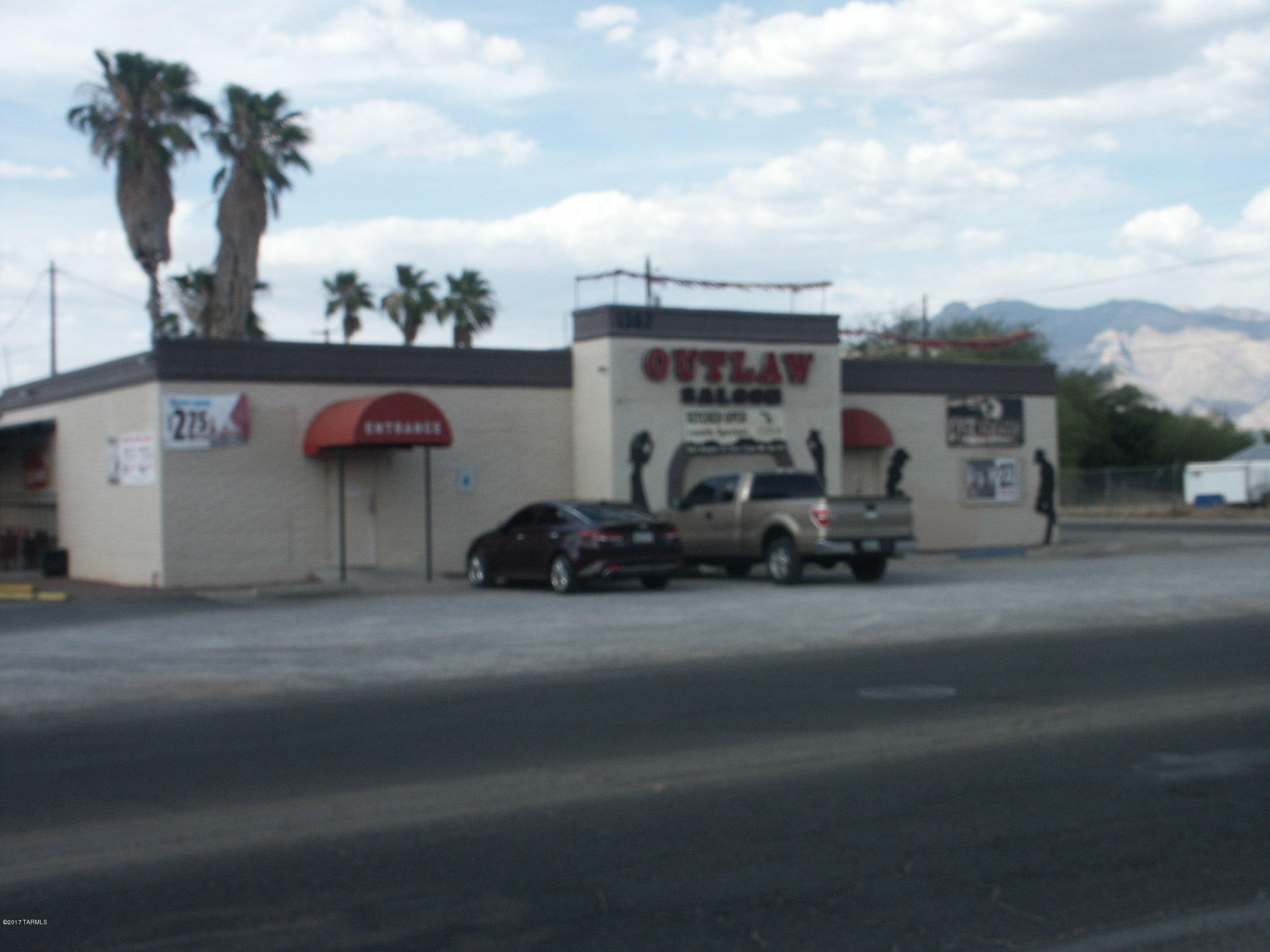 Iconic Outlaw Saloon and adjoining commercial strip located in the near NW with great visibility, parking and access. Gross monthly income approx. $8655 with a vacancy. Outlaw parcel may be sold separately. Bar business, liqourelicense and fixtures can be purchased by separate agreement. Call for full details.