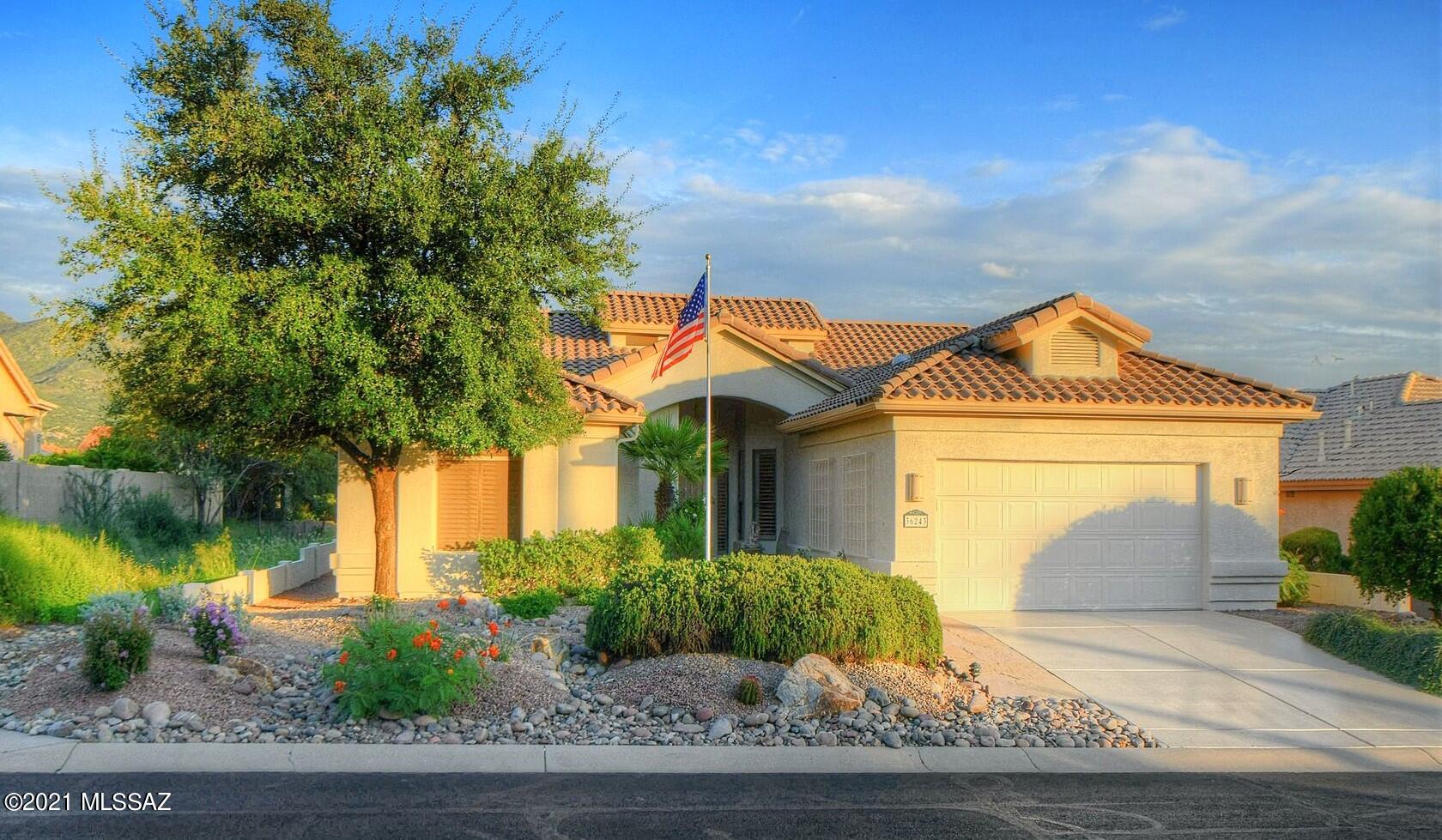 Saddlebrooke Spectacular Estancia Model boasts 2 Master Bedroom Suites! This Immaculate home is situated on a Private Lot backing to Wash w/ Magnificent Mountain Views. Featuring 2,587 sq. ft., 2 Beautiful Master Bedroom Suites + Front Office, Bright & Cheerful Kitchen w/ Maple Cabinetry & Quartz Countertops Open to Family Room / Dining Area, Large Living Room w/ Vaulted Ceiling & Views. Charming Rear Oasis w/ Covered Patio is surrounded by Colorful Landscaping, a Lovely Fountain & Extended Flagstone Patio for Entertaining.  Also featuring Laundry Room & Extended 2 Car Garage w/ Storage. This Gorgeous, Freshly Painted Home is Exactly what you've been looking for. Located in Saddlebrooke HOA TWO 45+ Active Adult Community w/ 18 Hole Golf Course, Tennis, Pickleball, Restaurants, Clubs & More