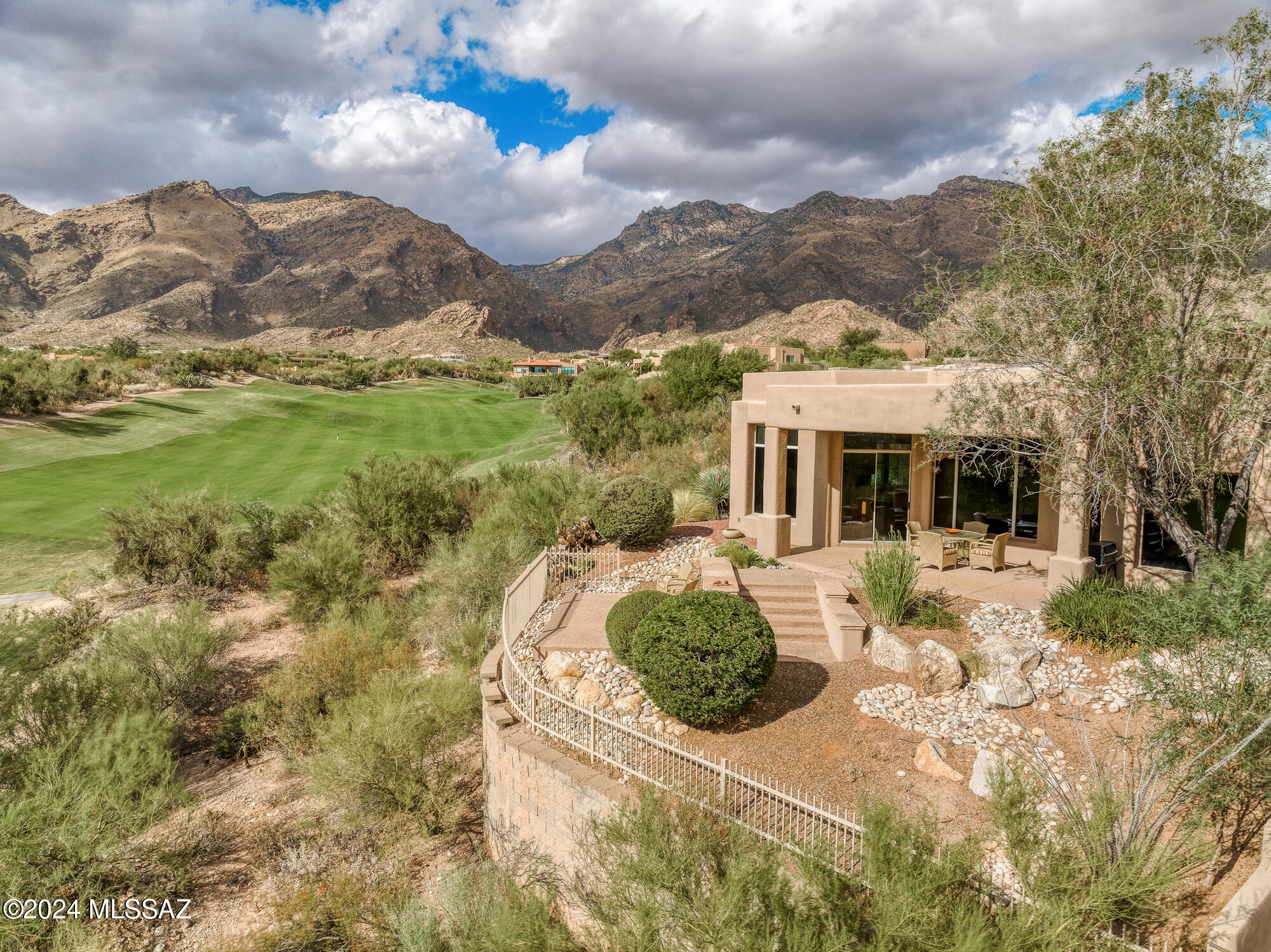 Commanding City, Mountain, & Golf Course Views From This Single Level 3BR & 3BA Masonry Built Home in The Coveted Enclave of The Ridge at Ventana Canyon. Private/Premium Lot Perched High Above the 12th Fairway of the VC Canyon Course w/Common Area to the North Allows For Panoramic Catalina Mountain Views From Every Room. Mostly Original Finishes Throughout Offers Perfect Opportunity To Make it Your Own. Features Include: High Ceilings & Oversized Windows Offering Plentiful Natural Light - Split Bedroom Plan - Great Room - Island Kitchen w/ Granite Counters, Gas Range, Breakfast Bar & Nook - Spacious Primary Suite w/Built Out Walk In Closet - Covered Back Patio w/City, Mountain, Golf Course, & Sunset Views. This is The Best of Resort Style, Easy Lock & Go Living!  Available Fully Furnished