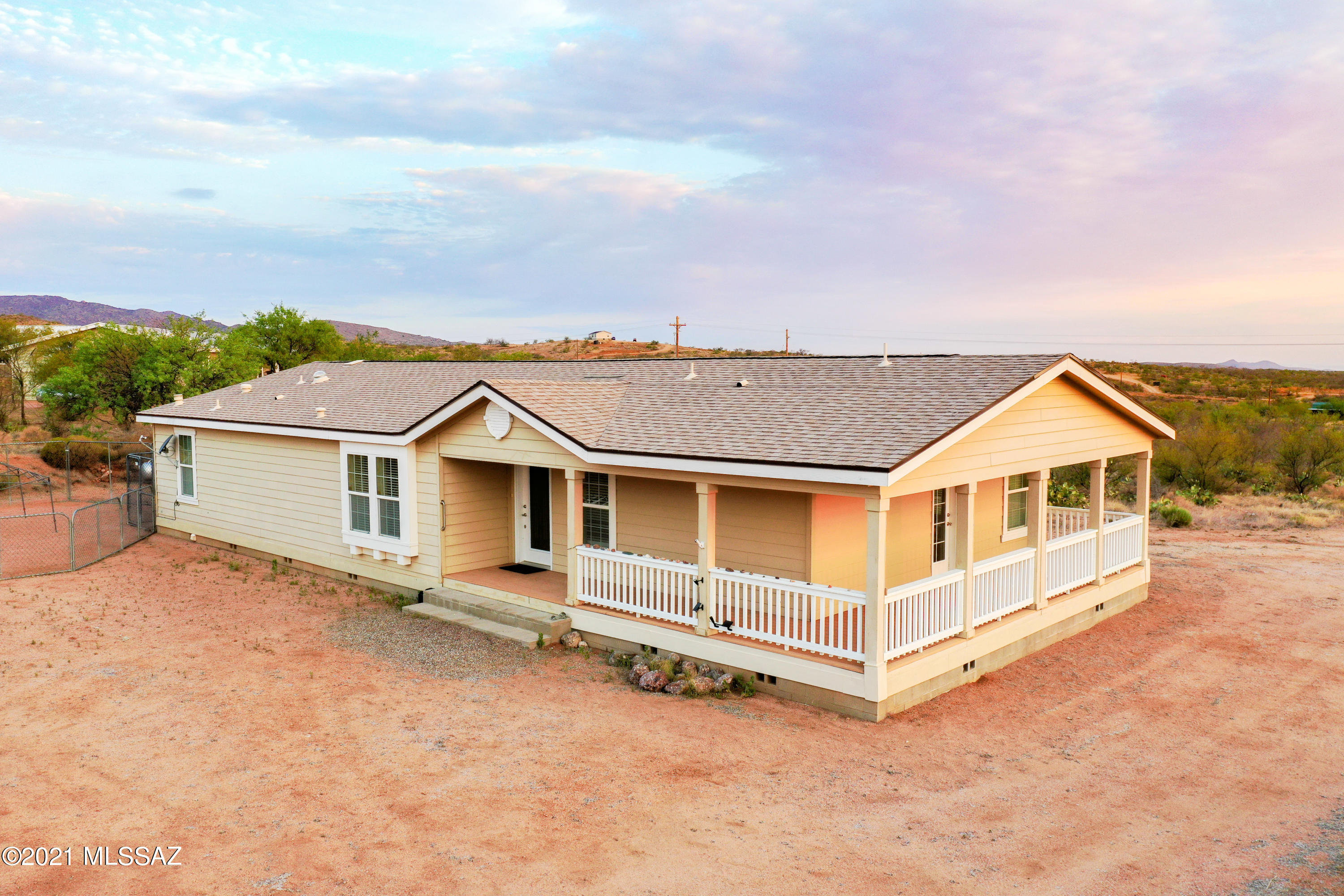 This move-in ready 3-bed 2-bath home sits on 1.25 useable acres, with incredible mountain views that can be enjoyed from the 6ft wrap-around porch. The kitchen features hardwood cabinets and stainless steel appliances, while the master suite has a large shower with dual showerheads and a walk-in closet. New roof and new HVAC system installed 2019, and the permanent block foundation should allow for FHA financing.  Horse property with plenty of nearby riding trails on State land and National Forest, with room for horse facilities to be installed. Shared well has four total shares, but only two shares are currently in use. Schedule a showing today!