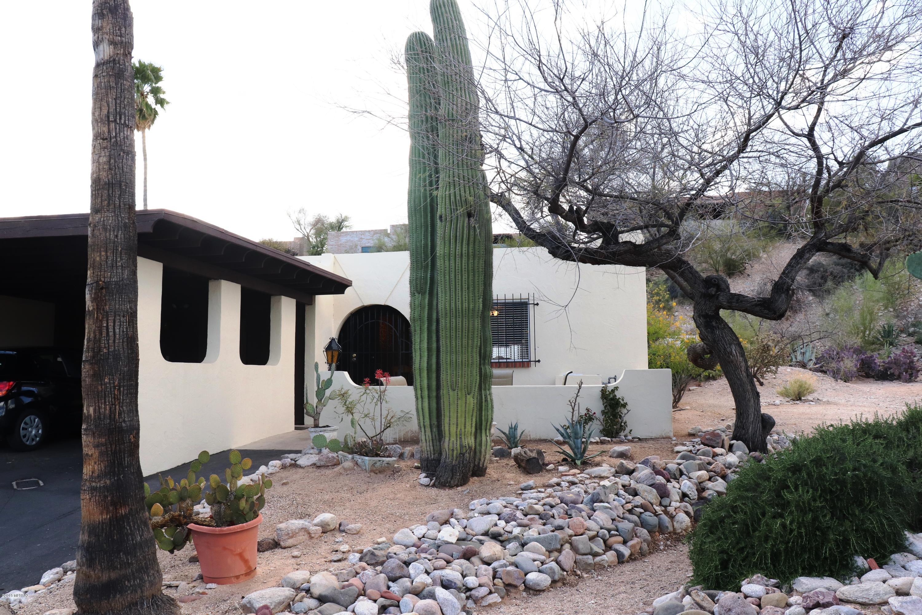 FULLY FURNISHED Feel of the Foothills lifestyle w/convenience of city living just around the corner! Minutes from shopping, restaurants & a 15-minute drive to lively downtown Tucson - this 2br/2bath+office townhome has it all! Furnished comfortably w/the necessities but w/out the clutter makes this home a refreshing getaway in the desert. Community pool is nestled amongst tall pine trees & desert scape giving a private oasis feel! BEDS: Queen/King *Fireplace doesn't function. Peak rate $2,900 (Dec-April) with $200/mo utility allowance. Low-season $1,800/mo. plus utilities. HOME IS EQUIPPED WITH WIFI BUT NOT CABLE T.V., TELEVISION CHANNELS ARE ACCESSED ONLINE - INSTRUCTIONS AT PROPERTY. EMS REALTY REPRESENTS THE LANDLORD ONLY ON THIS LISTING.