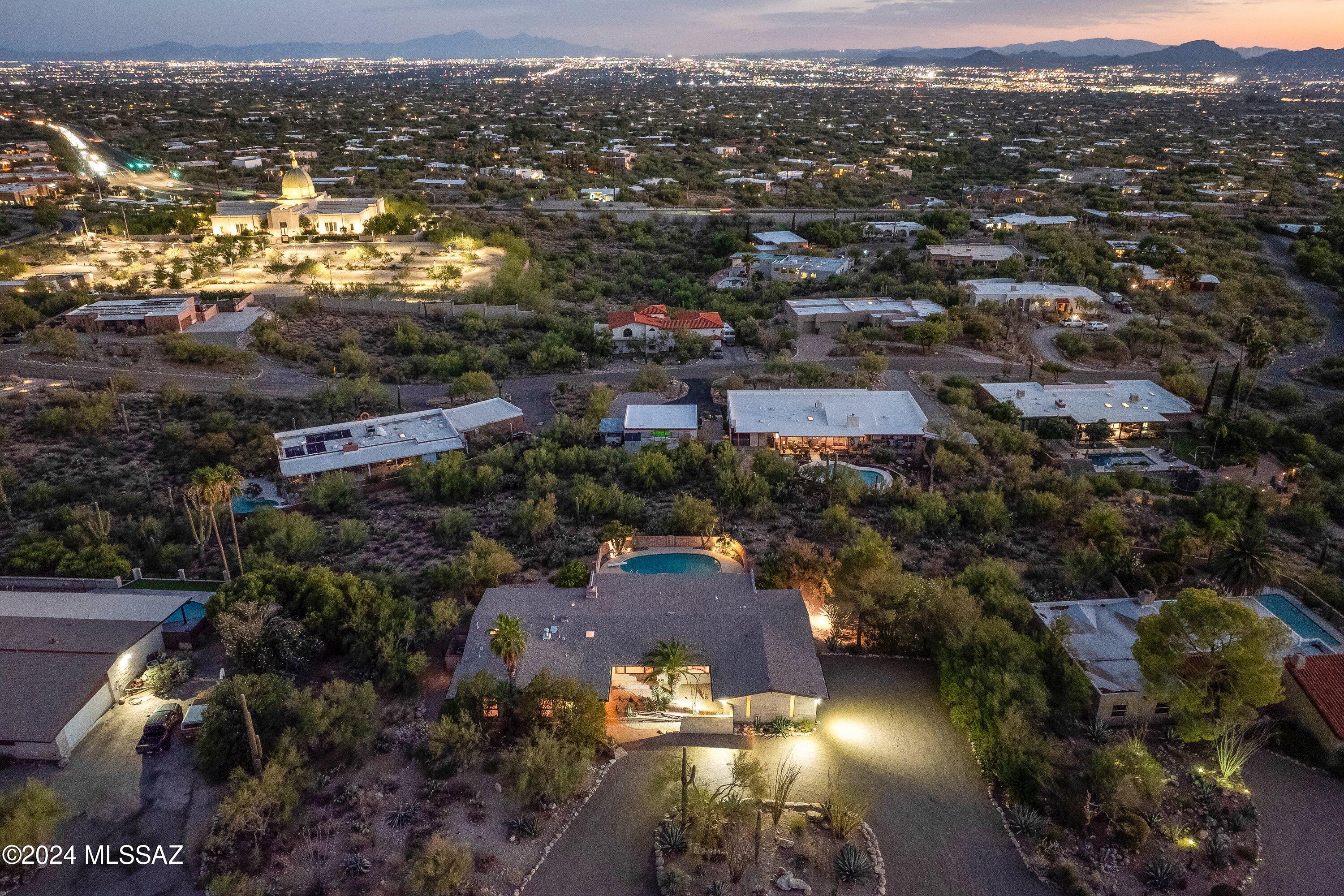 Charming Home with Pool and Great Views!
Welcome to this well-maintained 4-bedroom + den (could be 5th bedroom) 3-bathroom home in the Catalina Foothills. You'll find a comfortable, open living space with windows that showcase lovely city and mountain views. Step outside to enjoy the inviting pool and the peaceful desert surroundings. With hiking trails and golf courses nearby, you'll have plenty of outdoor activities at your fingertips. Conveniently located near shopping and dining, this home captures the essence of classic Tucson living.