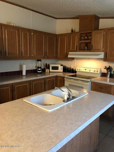 Horse lovers! 1 acre MH on 1 acre. Bring your toys, and your horses to this private 3 bdrm home that has been well kept. Lots of potential with this home. Priced to sell.