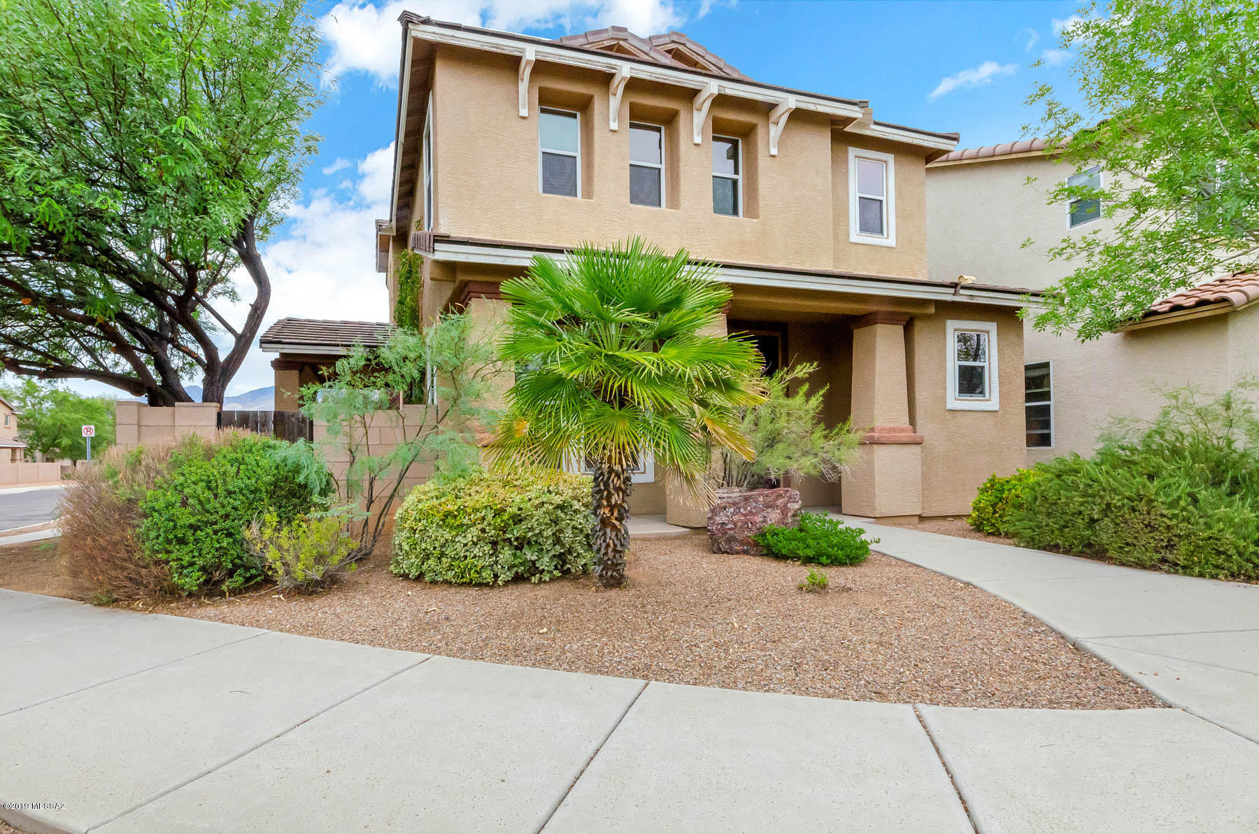 Beautiful 2-Story home in sought after Catalina Vista neighborhood. This well cared for home is on a corner lot with mature landscaping.This lovely home features an open & bright floor-plan with high ceilings ,recessed lighting, & faux wood blinds thru-out.Full interior paint & plush carpeting installed in 2018. Plenty of cabinets in the kitchen &  spacious laundry room downstairs. 3 Bedrooms & 2 Baths  upstairs & the master suite has double french doors leading into the bedroom. Master Bath has a separate shower & garden-tub Charming & well cared for home.Must see to appreciate!