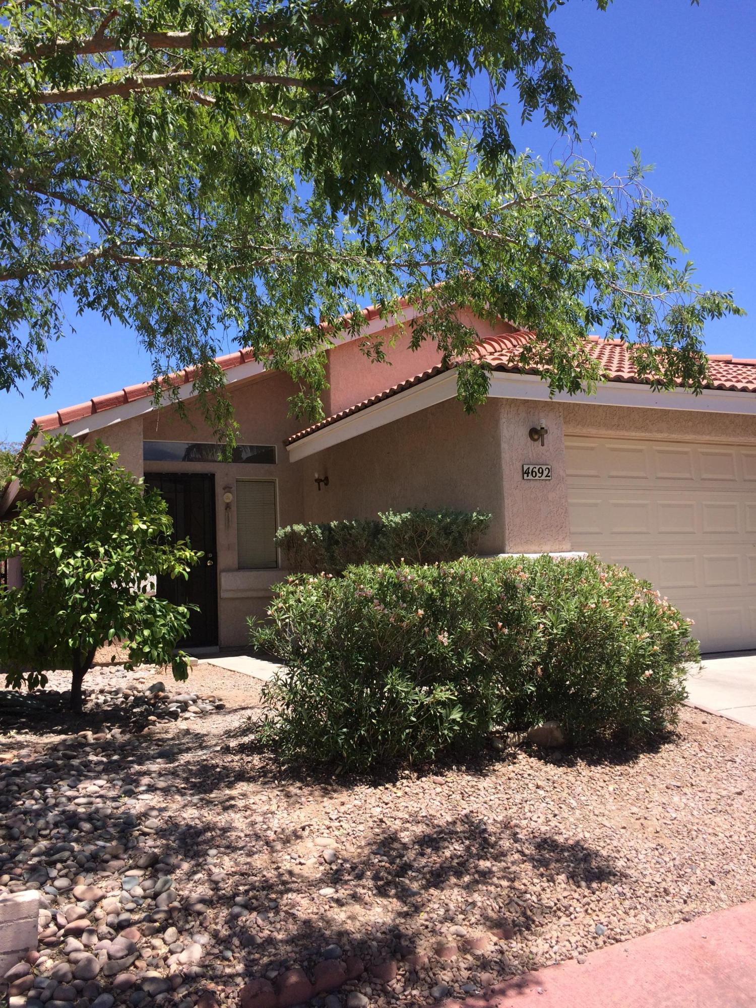 This three bedroom/two bath single family home features a large family room/dining room and new tile throughout. And a plus-- a bonus room in the back!  2 car garage and community pool.  What could make this property more perfect!