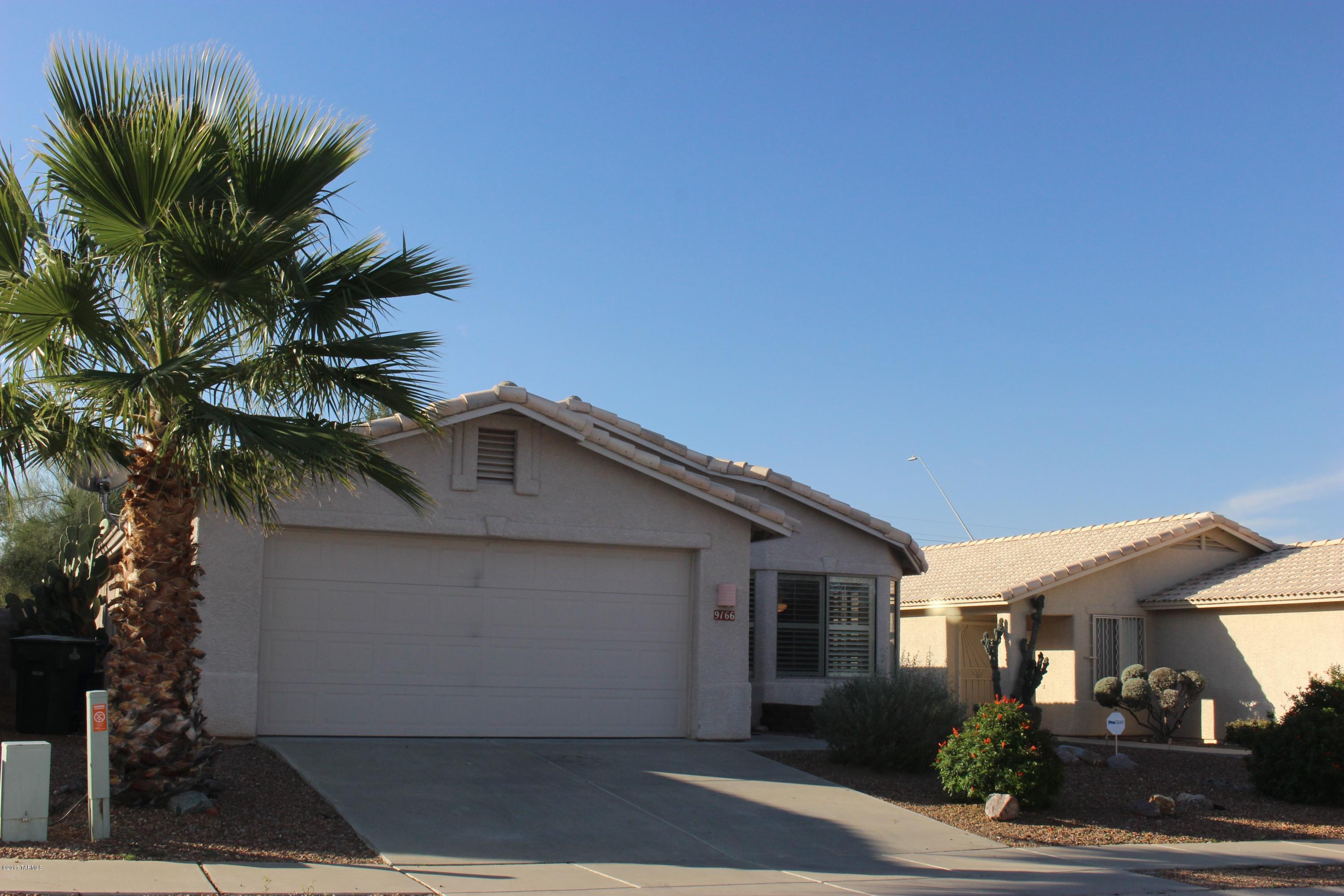 This sparkling family home has been freshly painted throughout  and has new carpet in all bedrooms. Beautiful tile flooring in all other areas. High ceilings, lots of windows, ceiling fans. Shutters throughout main living area and master suite. Bay windows in master and dining area. Covered patio and good size walled yard. Must see!