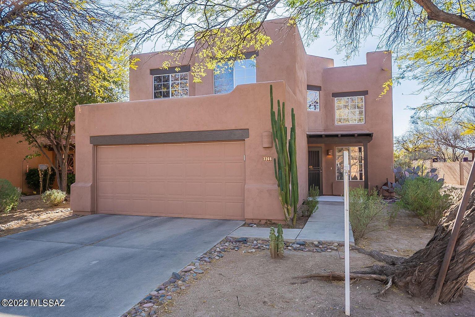 This lovingly maintained two story home seats on a premium lot in a coveted and tranquil NE neighborhood. Surrounded by nature this home features four bedrooms and three baths.  One bedroom downstairs for guest privacy. Kitchen w/ pantry, oak cabinets, granite counter tops, and center island. NEW HVAC system and water heater installed 2024. Roof recoated in 2024. Exterior has been freshly painted. New washer and dryer.  PELLA window slider to PREMIER lot boasting no neighbors to rear and greenbelt on one side. This home is surrounded by a beautiful desert landscape. Upstairs balcony is an extension of huge master bedroom & affords great views for beautiful and quiet desert mornings and afternoons. The back yard is a sanctuary w/extended brick pavers, covered patio, wrought iron view fencing, and mature landscape-drought resistant. Side yard provides extra storage or perfect space for a dog-run. Next to Rillito with direct access to bicycle and running path. Close to Sabino Canyon hiking trails, restaurants, grocery stores, top ranked Basis High School, Catalina Foothills HS, Fruchthendler Elementary School, within the boundaries of Tanque Verde School District,  Tucson Medical Center, and much more. This home truly is a gem!