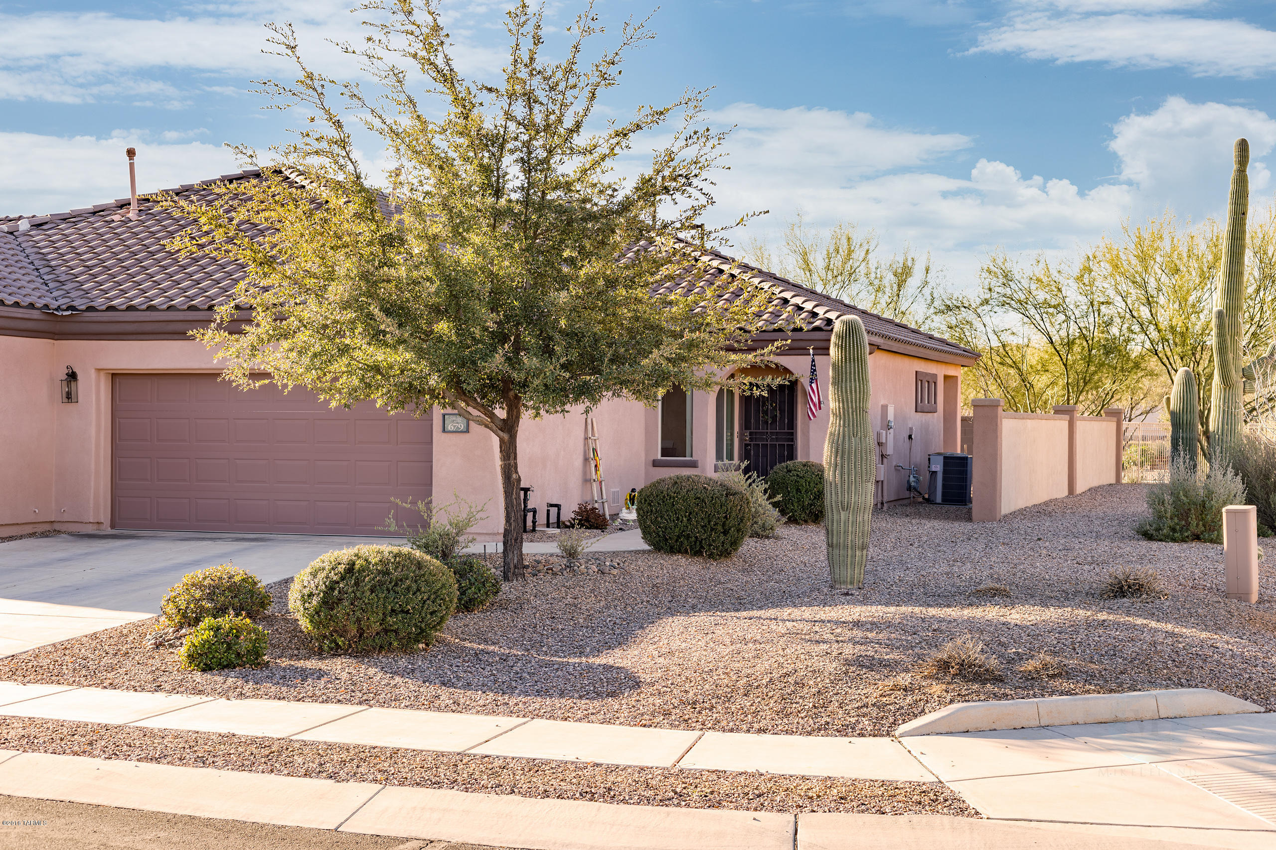 Perfectly maintained home in the 55+ community of Sonora at Rancho Sahuarita. Very private corner lot with a larger yard and high wall. Great open floor plan with substantial natural light, tile throughout entire home, ceiling fans and a large walk in closet. Clean & move-in ready! Enjoy outstanding amenities at the clubhouse exclusive to Sonora residents valued at over $2 million. You have access to a refreshing pool and spa, pickle ball courts, gym and fitness classes amongst other activities. Save money and time with the HOA included conveniences such as complete landscaping care for front and back yards, monthly pest service, exterior care and paint, and total roof maintenance and care. Furnished optional on separate bill of sale.