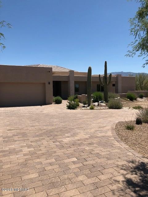 Stunning new 2017 contemporary with breathtaking views of the Catalina & Rincon Mountains await you in the prestigious gated community of Rancho Soldados.  A spacious & open floor plan features extraordinary flow encompassing 4599 sq. ft. 4 ensuite bedrooms, great room w/wall of windows showcasing Rincon Mtn.views & den/media.  Thoughtfully appointed finishes in serene colors & textures include gourmet kitchen with double Electrolux side by side refrig/freezer, granite counters & wetbar area opening to breakfast nook.  Relax in master ensuite with FP, Jacuzzi tub/walk-in shower, Alder custom cabinets with granite countertops & door to patio & pool.  Other luxury features boast Pella windows, 8' solid doors, wood grain porcelain tile in main living areas & covered patio leads to pool/spa.