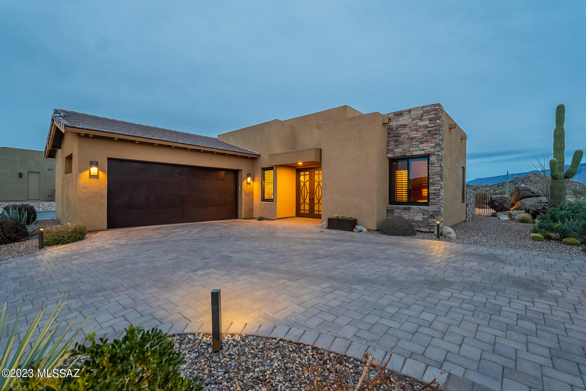 Welcome to this luxurious, semi-custom Fairfield home in The Enclave At Stone Canyon located in one of Southern Arizona's most sought-after golf club communities!
Situated on a .24 acre lot on one of the best lots in the community featuring panoramic mountain views and complete privacy while relaxing on your patio or enjoying the refreshing pool. Sophisticated upgrades and special attention to details both inside and out; this exquisite home is sure to exceed your expectations. Enter to discover an impressive great room with 12 foot ceilings, and with walls of windows and huge sliding glass doors. Impressive architectural details, attractive light fixtures, and sconces, and an exquisite powder bath add to the elegance of this home.
A true gourmet kitchen; featuring gorgeous upgraded cabinetry, built-in refrigerator, Wolf SS ovens, Wolf 5 burner gas cooktop complete with pot filler, 2 Fisher & Paykel dishwashers with custom cabinet panels, and a beautiful hammered copper sink. Expansive granite counters space, including a unique eat-in island and a walk-in pantry.
Primary suite with private access to the patio and pool, an impressive en suite complete with two separate closets, relaxing tub, a separate shower with a dual vanity. Additional highlights include owned solar panels, upgraded solid wood Alder doors throughout, Plantation shutters throughout, additional insulation in attic, plus spray cell foam insulation in the expansive 3 car garage with a 240 V circuit for electric car charging and epoxy floors. Conveniently located within walking distance to the Health & Fitness Club, Clubhouse and Championship Golf Course.