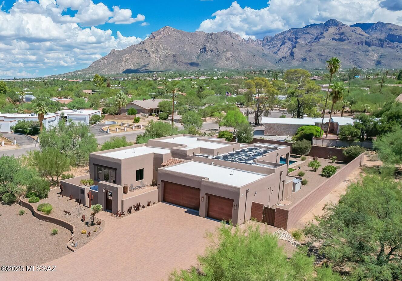 Built in 2014 by Insight Homes, this stunning Custom residence sits on a spacious, nearly one-acre lot in gorgeous Casas Adobes. Designed w/ lifestyle, luxury & technology in mind, the home showcases high-end finishes w/ thoughtful, extensive upgrades throughout. Incredible indoor spaces, anchored by an amazing Great Room w/ 12' tongue-and-groove ceiling. Incredible Open Kitchen w Monogram/Fisher-Paykel Appliances, Hickory Cabinetry, Granite Counters, huge Island + walk-in Pantry. Floorplan provides Grand spaces: Amazing Owner's Suite, Guest Suite & large Office/Den/3rd BR. Resort-Like backyard w/ oversized patios, covered BBQ area & Gas/Solar heated Pebble Tec Pool/Spa. 3-Car Garage. Furniture available on Separate Bill of Sale. Please ask for EXTENSIVE l Features & Upgrades List. No HOA