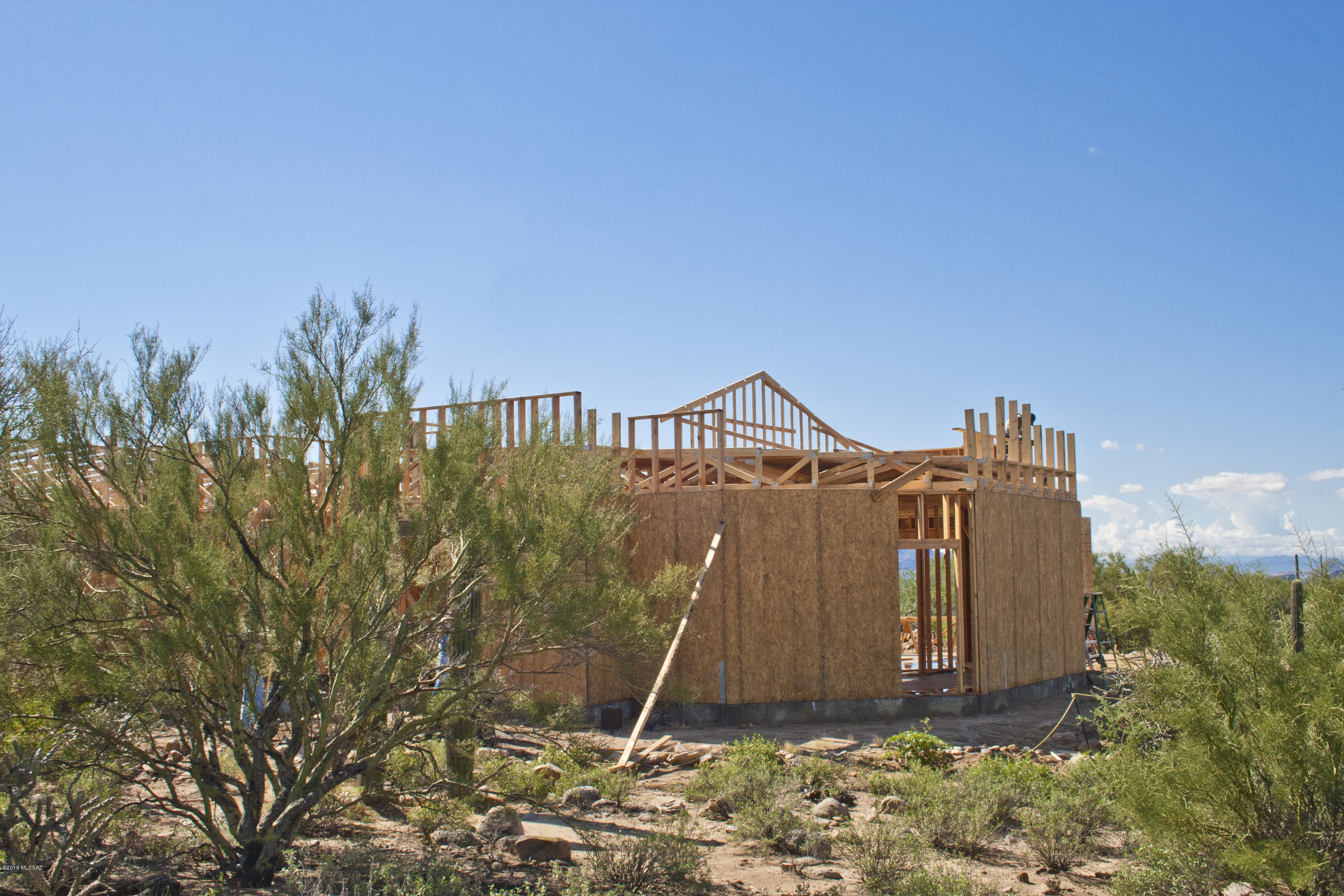 You've found VALUE at its finest in the gated community of The Estates at Tortolita Preserve with this 2,756 square foot design. John Herder delivers QUALITY construction and includes upgrades as standard! Featuring an open layout with a spacious great room off of the kitchen and a split bedroom design. Enjoy multiple covered patios, a 4-car garage, and a very large 2.51 acre lot that delivers views & privacy. The flexible design includes a 4th bedroom or use it as a den or dining. This community's location is ideal for those seeking an active lifestyle with nearby hiking/biking trails, off road vehicle access, and exceptional golf. Customize this spec that is under construction OR choose from other available lots & build your own dream home! View the 3D Walkthrough Tour under Photos Tab.