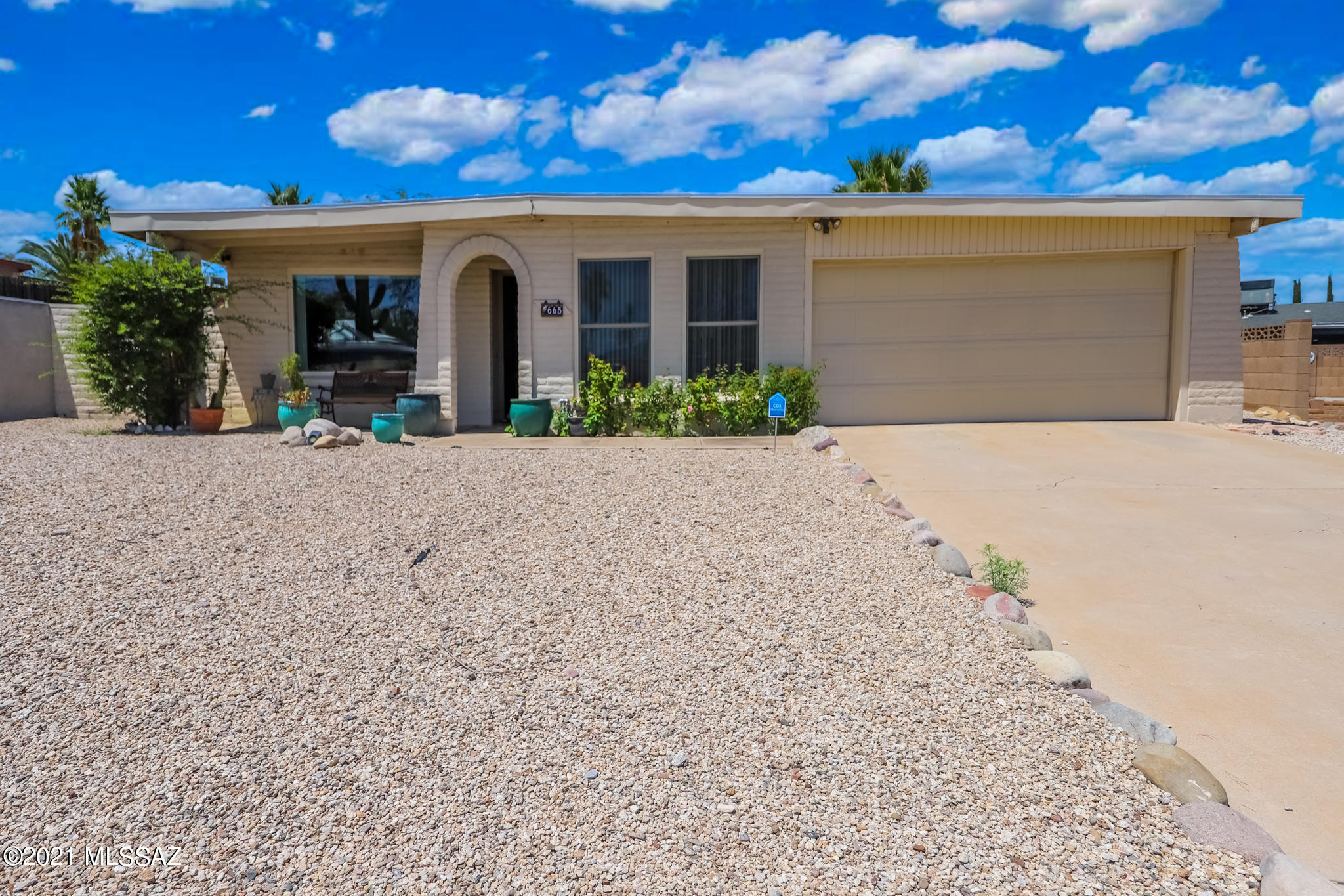Don't miss this beautiful, well-maintained east side gem!  This 4 bedroom, 2 bathroom home features lots of natural light, mountain views, and a backyard full of fruit trees and lovely landscaping.  With a brand new water softener/purification system, whole house air-purification system, a recent roof re-coating, and Anderson Windows throughout (4 years old), this house is move in ready.  Call today for a showing!