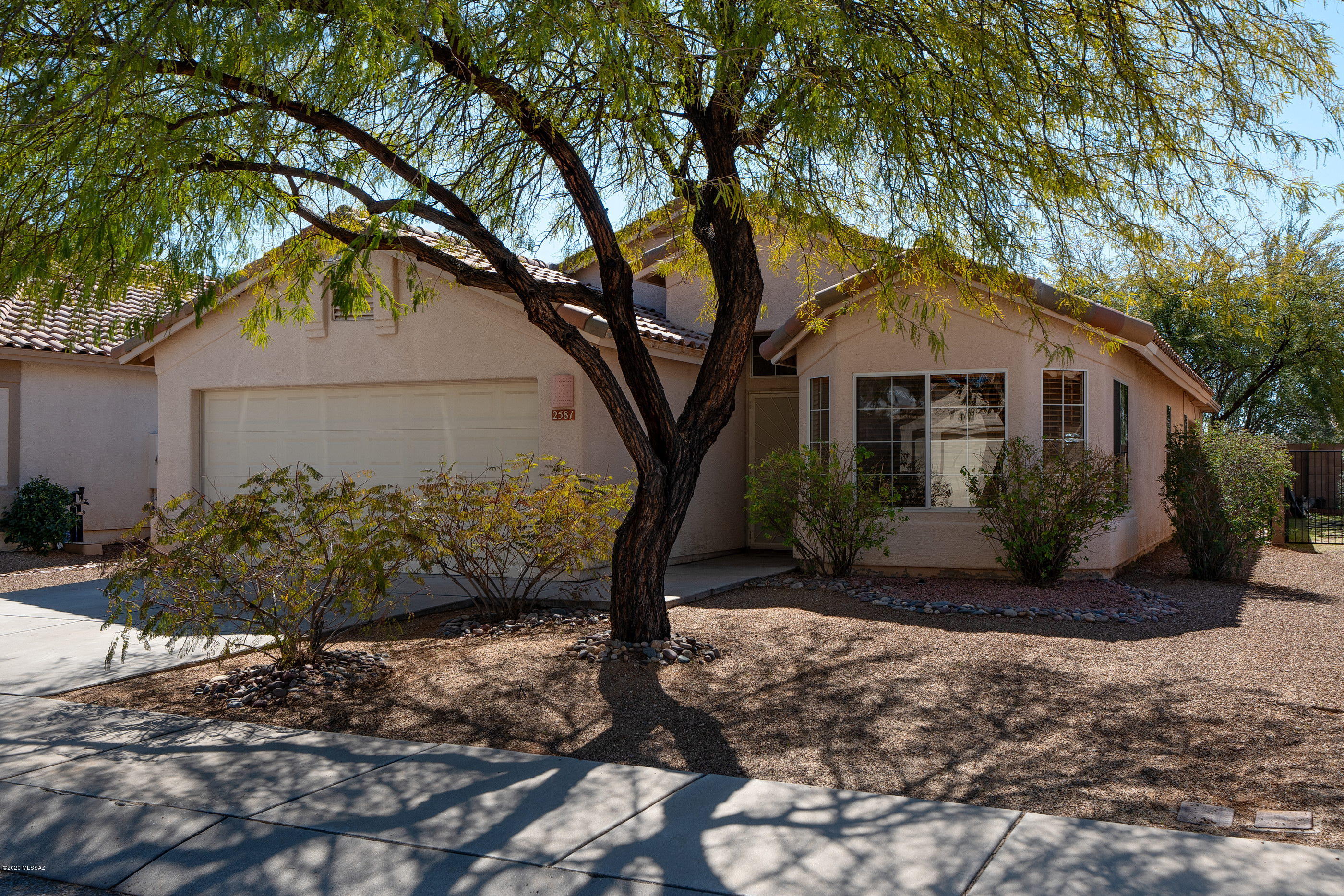 Pre-inspected ADORABLE HOME in popular UPPER BLUFFS priced to sell & backing up to common area.  NEW HVAC, NEW HOT WATER HEATER, NEW GARBAGE DISPOSAL, NEW EXTERIOR & INTERIOR PAINT, & NEW IRRIGATION SYSTEM & TIMER !  Roof repairs have been made as well as many other repairs found in the inspection.  Ceramic tile in the living areas and baths. Kitchen has a roomy nook with bay window. Great Room has built ins & high ceilings w/access to covered back patio.  Master bedroom has access to backyard.  Master bath has dual sinks, separate shower & tub. MOVE IN READY !  Located minutes from Foothills Mall, Pima Community College NW Campus, NW YMCA, and easy access to1-10.   HURRY - this one is a gem and will not last. SPDS & CLUE available upon request.