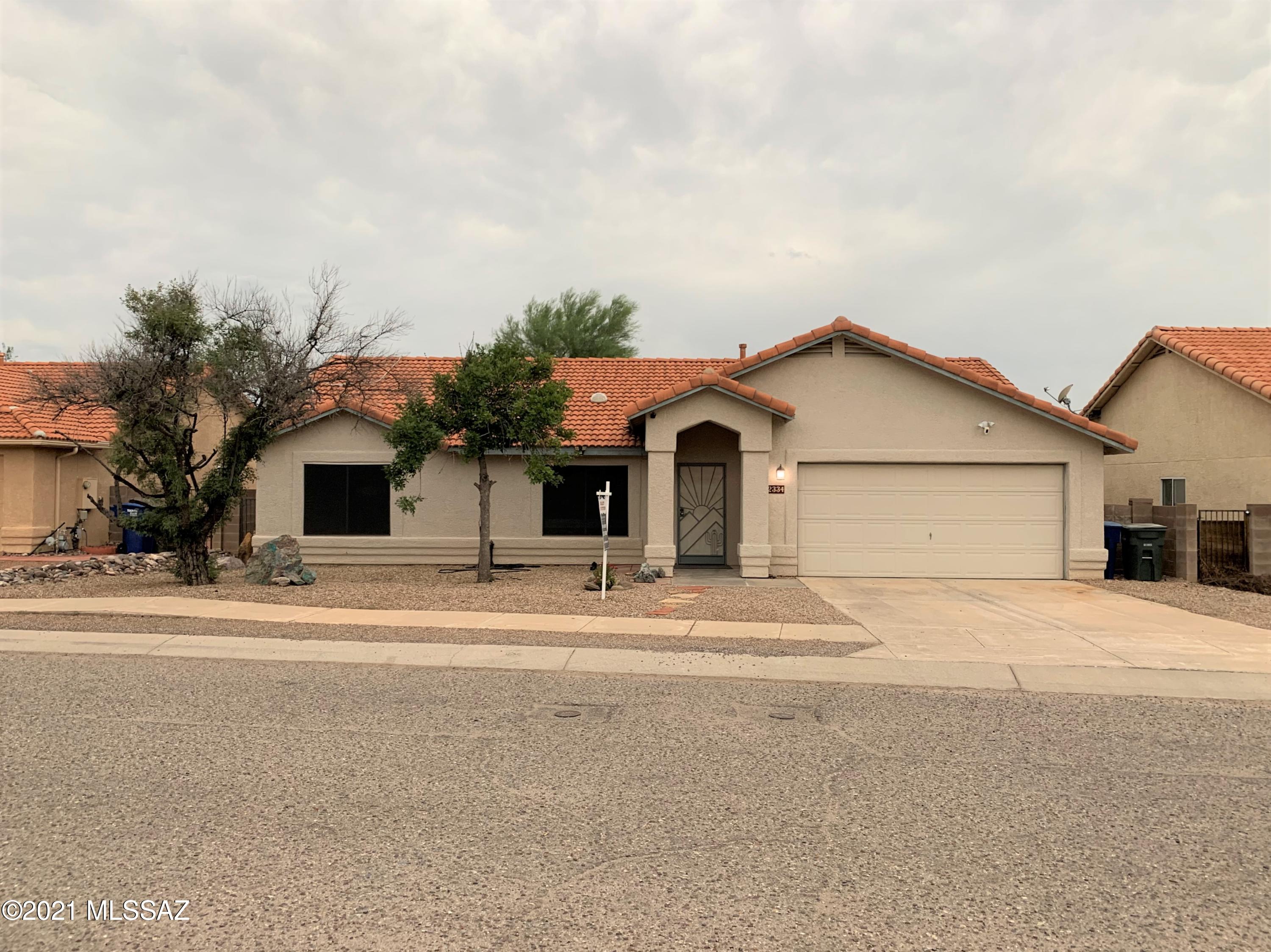 Beautiful, well-maintained, single story, 3-bed/2-bath ranch-style home in the highly coveted Casa Rita neighborhood. This move in ready home features tile roof, large covered patio, outstanding landscaping plus Mountain views & walking trails. Chef's kitchen with gorgeous granite countertops, gas stove & plenty of cabinets. Lovely master bedroom features a walk-in closet with plenty of storage space. Home also features roof-top solar panels that can cut your costs by half. Huge double garage w/ shelving work space & extras storage. This is a true find on the east side of town! With Vaulted ceilings & tile throughout. This home offers NO Home Owners Association!