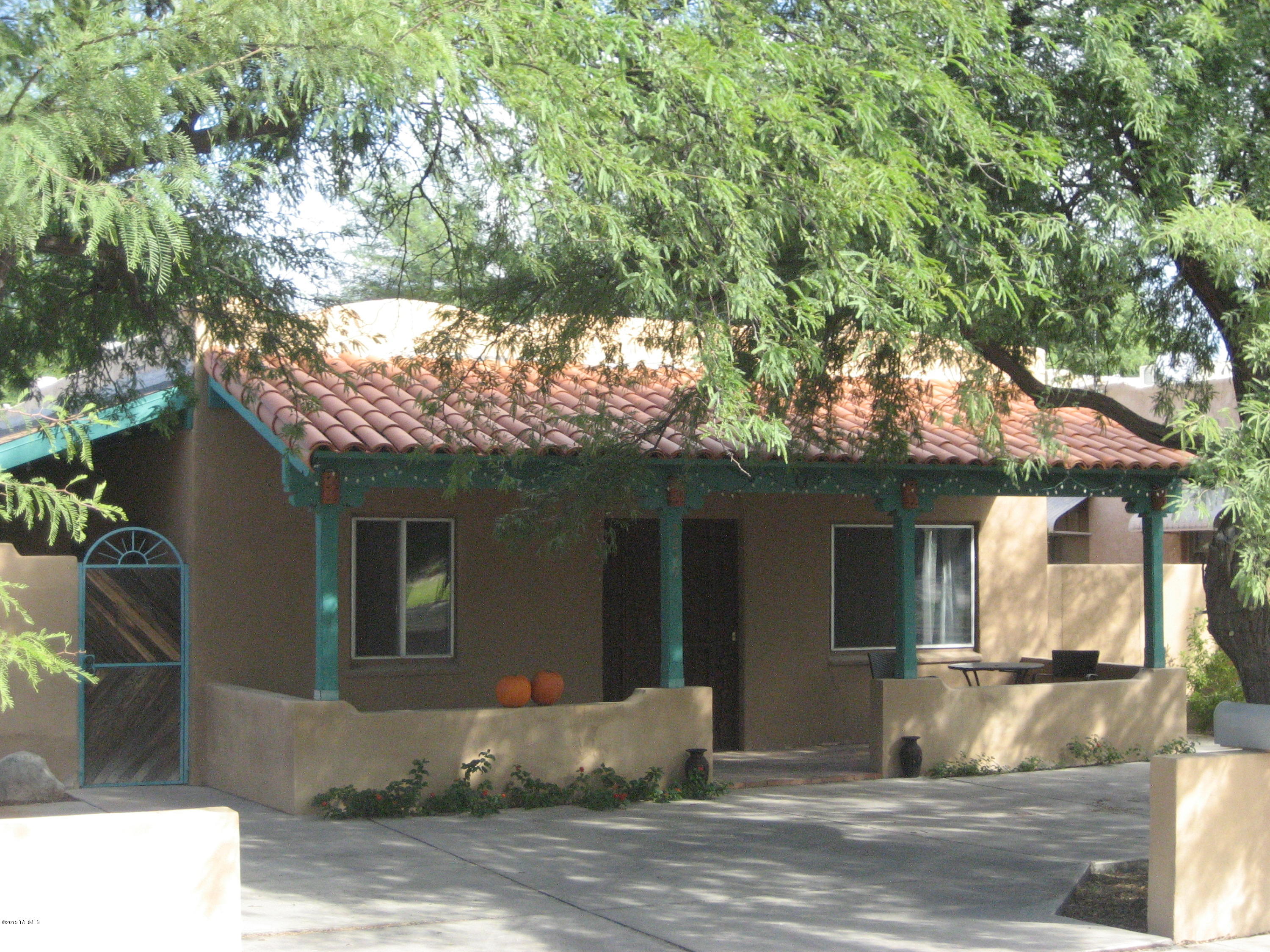 1935 charmer in the Sam Hughes neighborhood w/tastefully updated kitchen & baths as well as a Master Suite addition w/walk-in closet & bath w/shower. Basement has a 1 bedroom & two large rooms for office/game room use, one of which has exterior stairs to the back patio. Beautifully refinished wood floors with Mexican tile & some carpet in the basement. Large, 3-car garage designed to park RV plus a spacious workshop & storage space. Generous area for parking in backyard w/electrical hook-up & gated entry from alley. Side & back patio areas w/fireplace and a yard with grass area & shade trees. 5-year roof warranty for new services provided by Thatcher Roof Systems (11/21/2015 for $5,950). Check out the only house with all of these amenities that is currently available in the Sam Hughes area