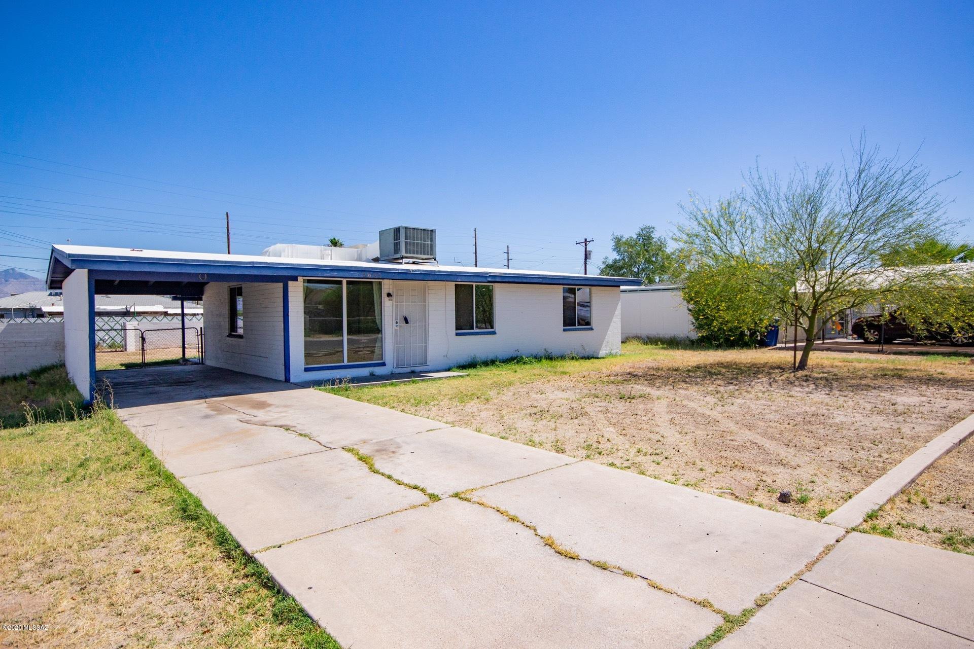 Cute house! Sellers have done upgrades over the last few years. Interior painted. Dual pane windows..Newer kitchen with lots of cabinets, including large pantry cabinets. Mountain views from the breakfast area, kitchen and master bedroom. Rooms are decent size, lots of windows. Large yard with double gate to alley. Great home for 1st Time Home Buyers or investment property. One car carport, storage, laundry room off the covered back patio.