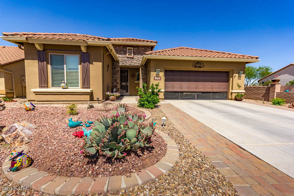 Popular Newport model on a quiet cul-de-sac. Brick exterior entry. You'll spend lots of time out back under the huge pergola. NNW backyard direction. Lovely landscaped yard.  2BR/2BA plus den.
Open floor plan, plantation shutters. Granite kitchen counters, black appliances, white kitchen cabinets. 2 car garage. Leased solar system. Enjoy low electric bills.