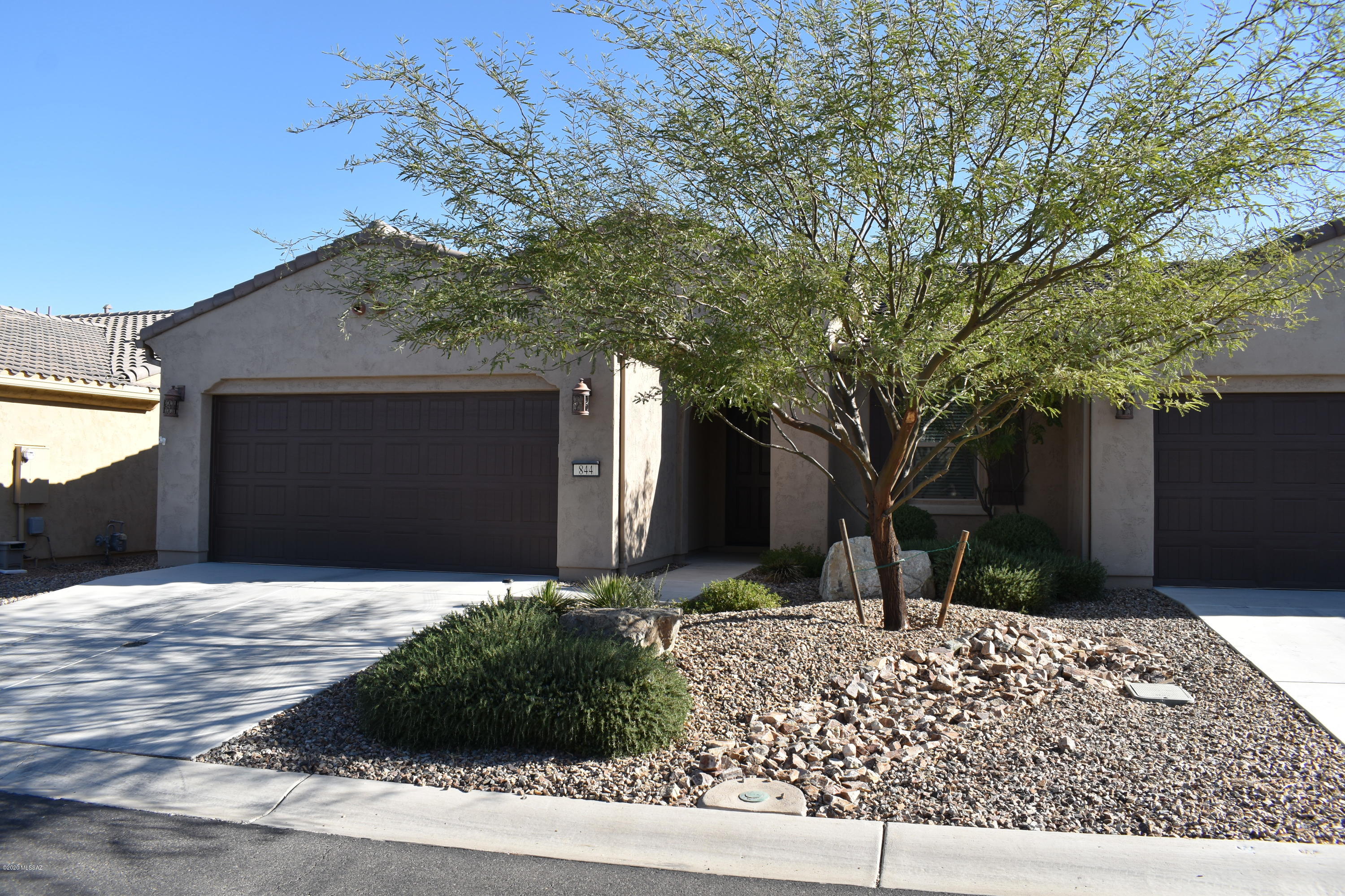 Beautiful, fully furnished, move-in ready 2 BR/2BA Quail Creek home just need you!  Bright, open floor plan includes large kitchen with island, granite counter and stainless appliances. Garage has epoxy coating. Outside, enjoy your semi-private patio with no yard work, pest control and maintenance taken care of for you. Instead visit the clubhouse, recreational facilities or play a round or two of golf all in your gated community.