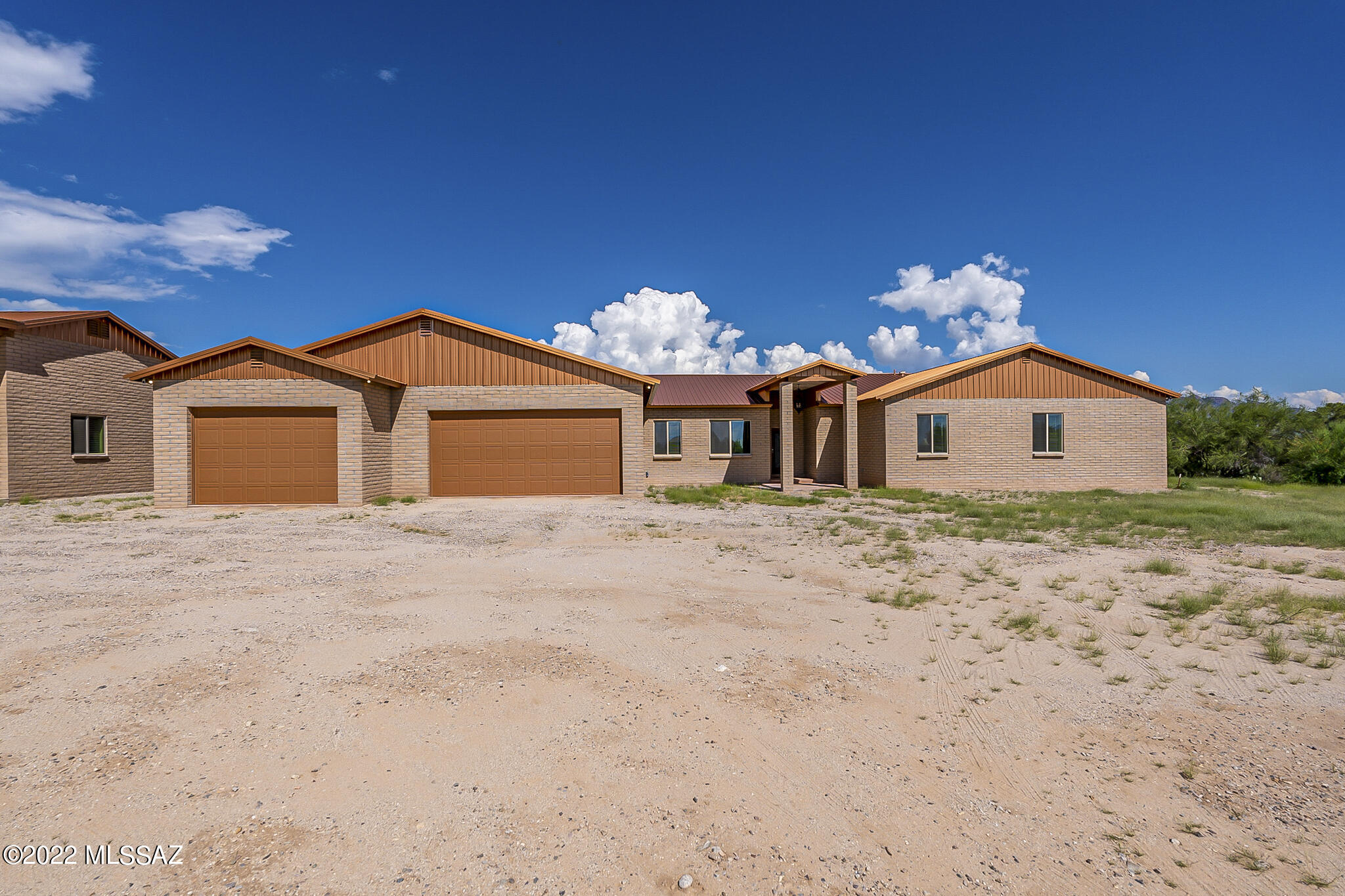 Stunning new 2020 cowboy glam custom built home on 3.31 acres. Privacy and peace with gorgeous mountain views. Built to be a forever home. Barely lived in a few months. Unbelievable 3 way split bedroom floorplan featuring 3 enormous master bedrooms with designer bathrooms for each including bidets, smart mirrors and upgraded shower fixtures. Large walk in closet for all 6 bedrooms. Additional guest house with 2 bedrooms and bathroom. Can be air bnb, rental income, or next gen for parents to live onsite. 2 Garages-one is an oversized 3 car and the other can fit 4 tandem and has an
RV garage.  Crystal chandeliers, soft close drawers, GE profile black matte appliances. Yard is ready for you to create your outdoor oasis or horse property. Schedule your showing now