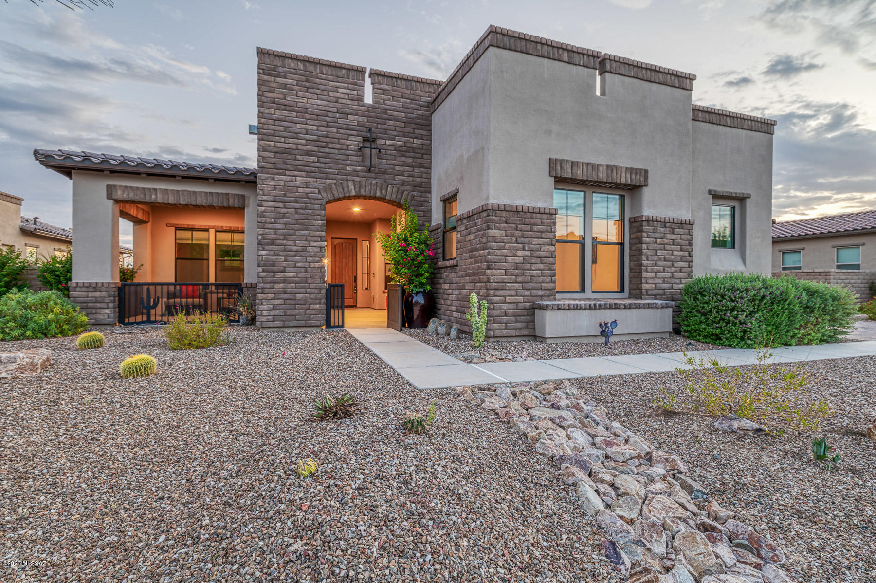 Welcome Home to the Highly Sought after Community Built by The Toll Brothers. This Luxury Home has it all and more, Chefs Kitchen, Formal Living & Dining, Office, Oversized Greatroom with Coffered and Beamed Ceiling, Glass Corner Sliding Doors that Extends Your Living Area into the Backyard Oasis. 4 bd and 4 full bath including a Separate Casita your guests will sure to be Impressed. Step into your Gourmet kitchen with Custom Knotty Alder Cabinets & Doors, Travertine Flooring throughout. Master Suite with Oversized Master Bathroom featuring Decorative Tile, Soaking Tub, Dual Vanities and Walk In Closet. Don't miss the Backyard Oasis with Custom Heated Pool, Water Feature, Lighting, Water Fountain and Patios. Citrus Trees, Pergola and Raised Garden. Relax and enjoy Sunset Views for miles.