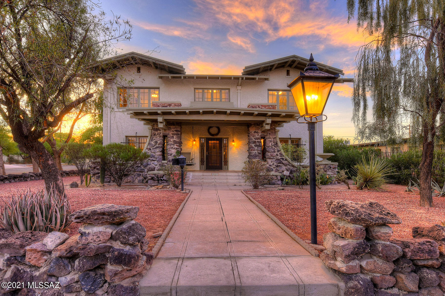 1916 Goldschmidt House in West University Historic Neighborhood.  Timeless, elegant & lovingly restored. Beautiful oak floors. Original crown moldings.  Large walls of windows throughout. Bathrooms remodeled w/imported French tiles. Large living room w/FP, formal dining room w/ period crystal chandelier. Butlers pantry w/ 2nd  dishwasher, tons of storage. Remodeled kitchen w/antique stove, newer appliances. 4 bedrooms + basement office. Master w/ ensuite bath and fireplace. 2 separate guest homes for in-laws/Airbnb. Upstairs has AZ rm, kitchen, livingrm bedrm & ensuite bath, Studio has kitchenette, full bath. Separate laundry for gsts. Lushly landscaped yard, w/arbors, pavers, pool & spa!  2 car garage, bike shed  & carport! Walk to UA, modern streetcar & downtown! On historic register.