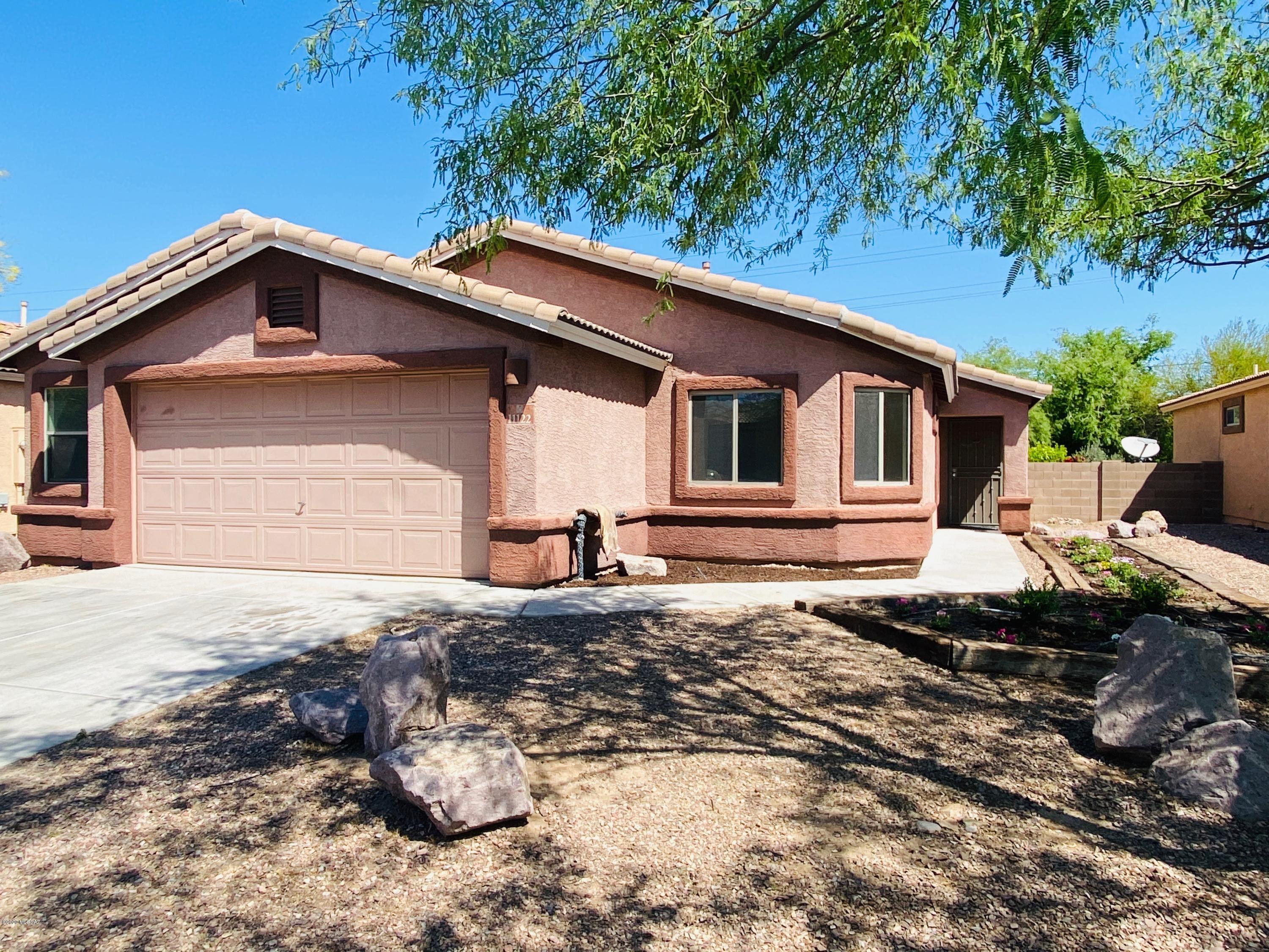 Move in ready home in desirable Gladden Farms! 4-bed 2-Bath open floor plan home with vaulted ceilings. Move to this quiet street with view fencing in a fast growing neighborhood! This home has custom neutral tile in all the right places, New carpet and fresh paint inside and out! Store your toys in the extended side yard with 9' gate, storage shed or 2.5 car extended garage. Mature fruit trees, vines, grass backyard and planters front and back allow you to plant whatever you want or nurture what is currently there. Non-potable water system keeps the water bill low! Come send your kids to an award winning elementary school, play in one of the multiple parks, run the paths or cool off in the splash pad at this fun family friendly neighborhood!