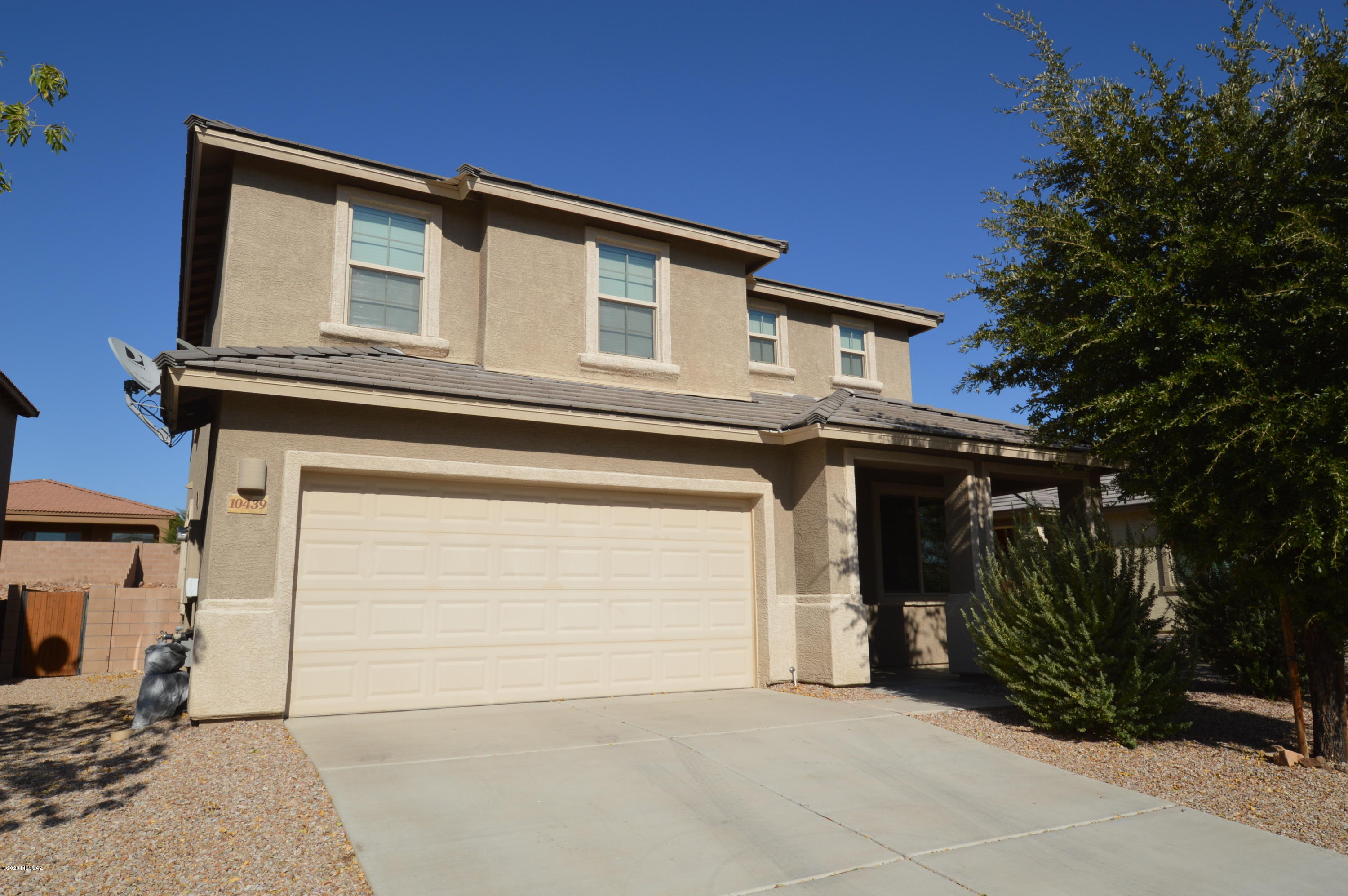 Stunning 5BR home located in desirable Vail school District! Extremely spacious! Kitchen has granite countertops, a Large Island with bar, gas range, and a built-in microwave! This lovely home has 1 bedroom downstairs and the rest located upstairs. Loft space could be utilized as a rec room, private family room, or play room! The master suite has an incredible oversized shower with glass enclosure, tile surround, rain shower head and dual controls! Large yard equipped with covered patio! Don't miss out on the wonderful home! CALL TODAY!