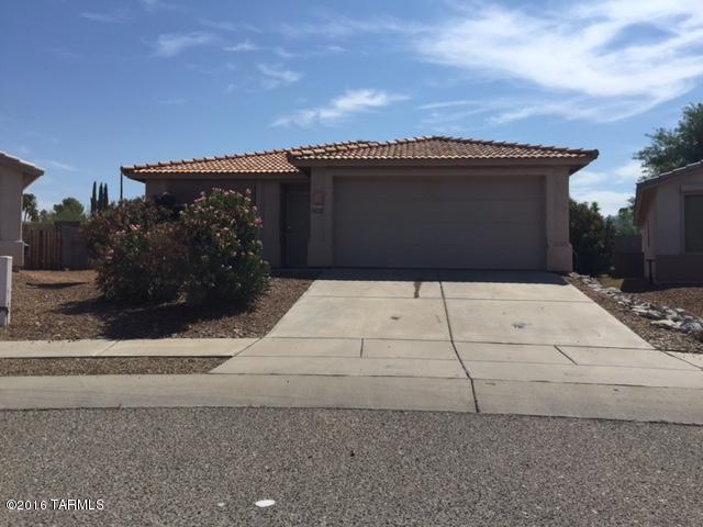 Home in great condition with 3 bdrms + family room/great room + Arizona room!! Range, microwave, refrigerator, dishwasher, easy care yards, and 2 car garage with workbench.