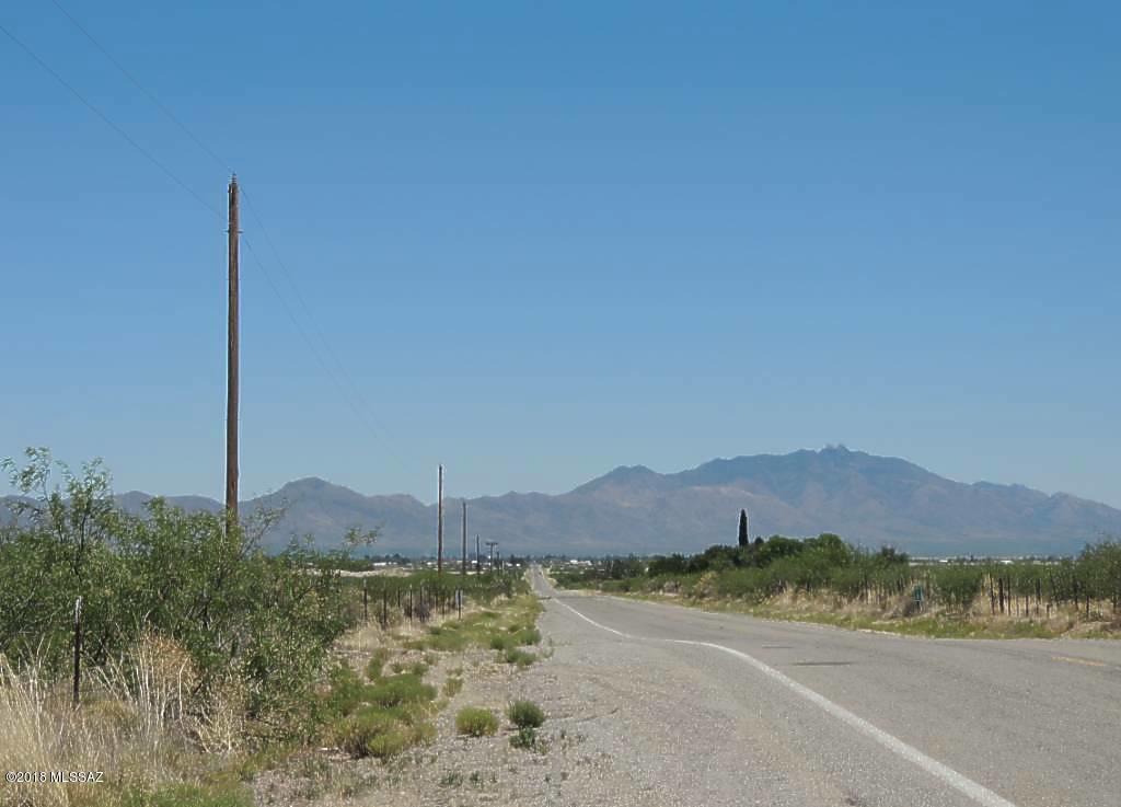 Approx. 1,245 Acres fronts Airport Rd, west of Willcox. Paved road and county maintained. Property perimeter is fenced and some cross-fencing. Attractive price for property that could be developed into residential, commercial or farmed. Pistachio, Pecan, Apple, Peach Orchards in the area. Willcox is becoming known for their vineyards and wines.  It's becoming more difficult to find larger land parcels with so much potential. The property has been Master Planned for development with low to high density residential, mobile home park and commercial uses. One newer registered domestic well on the property and another old well- condition unknown. There is a grazing lease to neighbor, which keeps the property taxes low.  Buyer will need to enter into a new lease agreement. Owner may trade.