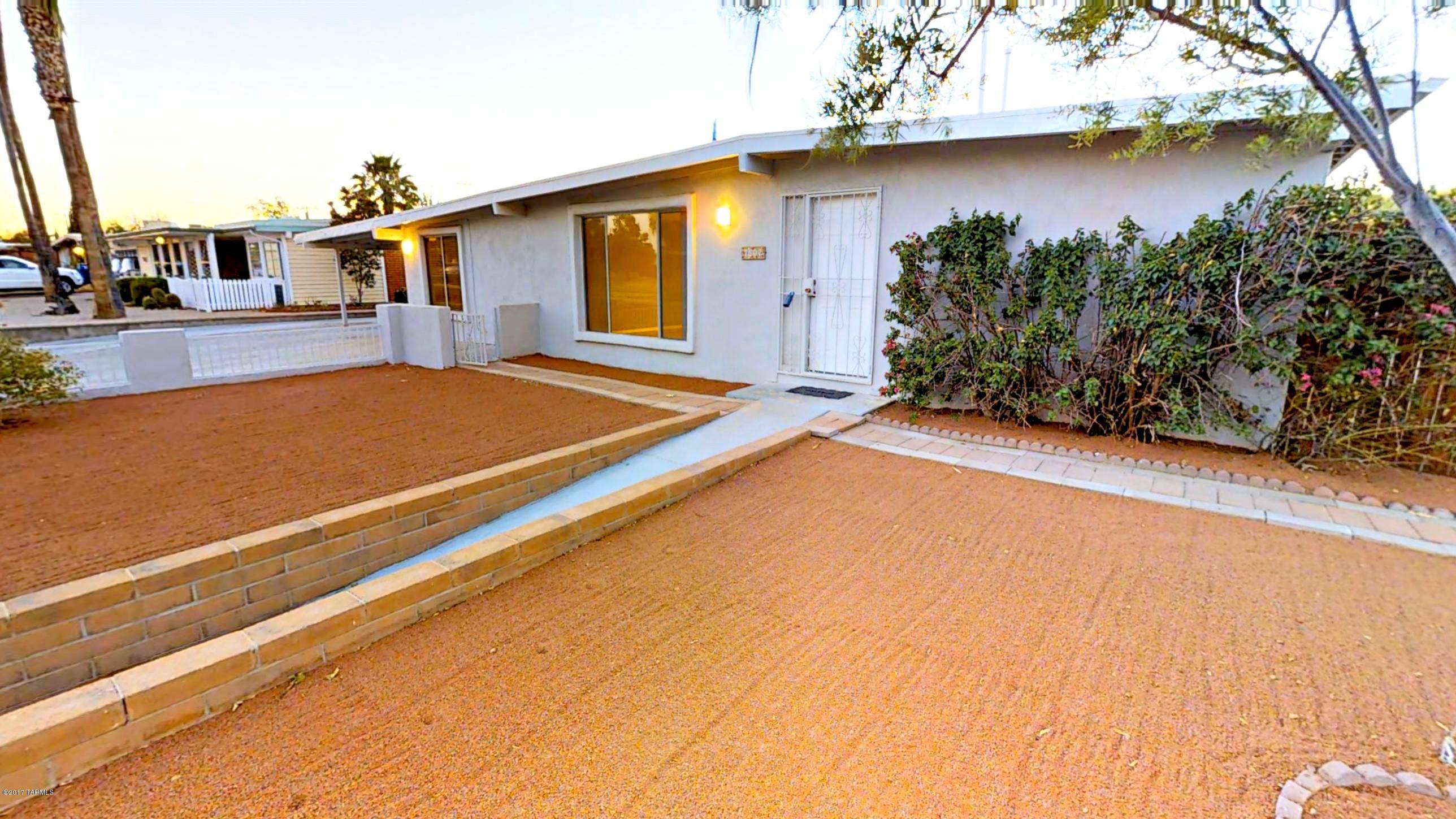 Great Income opportunity on this east side home! NO HOA! Home was remodeled in 2017 to include a brand new kitchen and master bathroom addition. Kitchen has been fully renovated with brand new cabinets, subway tile back splash, Quartz counter tops and  stainless steel Samsung appliances and center island stove. Hall bath has dual shower heads, tile surrounds and new fixtures. New carpet and flooring through out entire home was put in in 2017. AC unit and hot water heater are less then 2 years old. Low maintenance front and back yard. Back yard is very private with tall block walls and covered patio. Conveniently located to many amenities- bus lines, shopping, 15 mins from DMAFB and within a short walking distance to Dietz K-8 school!.