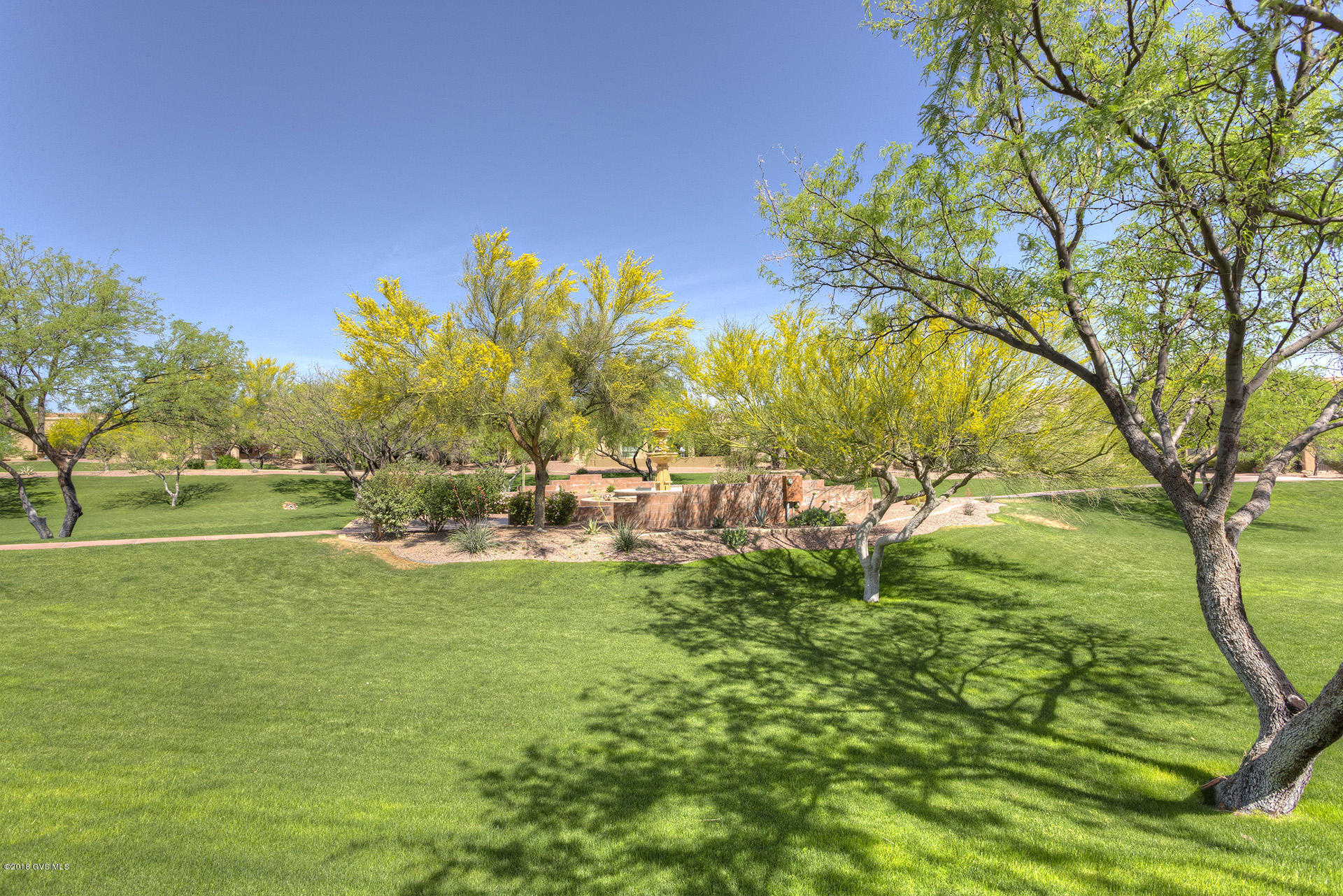 This one owner home has been well taken care of and appears larger than the 1282 S.F. thanks to the great room design and big bright windows that draw your attention to the beautiful Green Belt and Community Fountain behind. Super outdoor spaces take advantage of this prime location with full covered back patio, brick tumbler extension and remote controlled patio shade. This split plan ofers a huge master BR w/ oversized window to view the community green space. Master Bath has a double sink vanity, EZ care shower and walk in closet. Front BR has a bay window and step in closet for your guests. This home has soothing paint colors, big Living room bay w/ built in entertainment center and tile in all the right places. Maple Cabinets adorn the kitchen along with a modified serving  bar.. ..and is located conveniently close to the garage for bringing in your groceries. Incredible Value for this indoor-outdoor package.|\n|Life is good in Las Campanas Village as it is a one of a kind HOA that is set up much like a condo, but w/ fee title. They maintain your landscaping, stucco, paint and roof. Also included is the water for your landscaping; monthly pest control; expanded basic cable TV; weekly trash and recyclable pickup; fire, hazard and liability insurance; common areas, gates and road upkeep; and they also maintain a healthy reserve fund. This is the Lifestyle You Deserve.