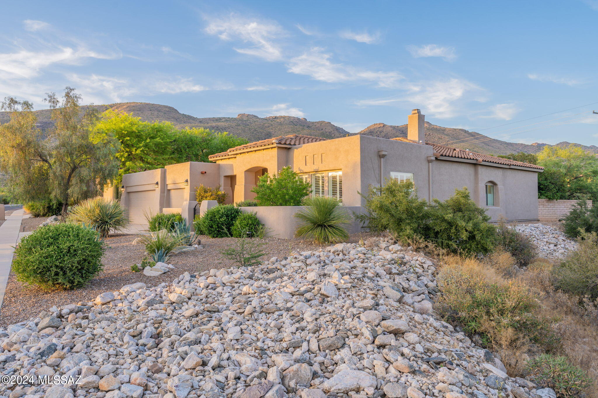 Back on market at no fault of the seller.
Indulge in the harmonious blend of luxury and nature at 5130 N Coronado Vistas Place, a 4 bed, 3.5 bath haven in Sabino Springs, bordering the Arizona National Golf Course. The thoughtful split floor plan offers a seamless balance of tranquility and functionality. Enjoy abundant wildlife and unobstructed views with no rear neighbors. This updated home features a shimmering pool and spa, perfect for relaxation and entertainment. Located less than 30 minutes from the University of Arizona, La Encantada, and the airport, and 60 minutes to Mt. Lemmon, this meticulously maintained gem ensures a lifestyle of unparalleled comfort and splendor.