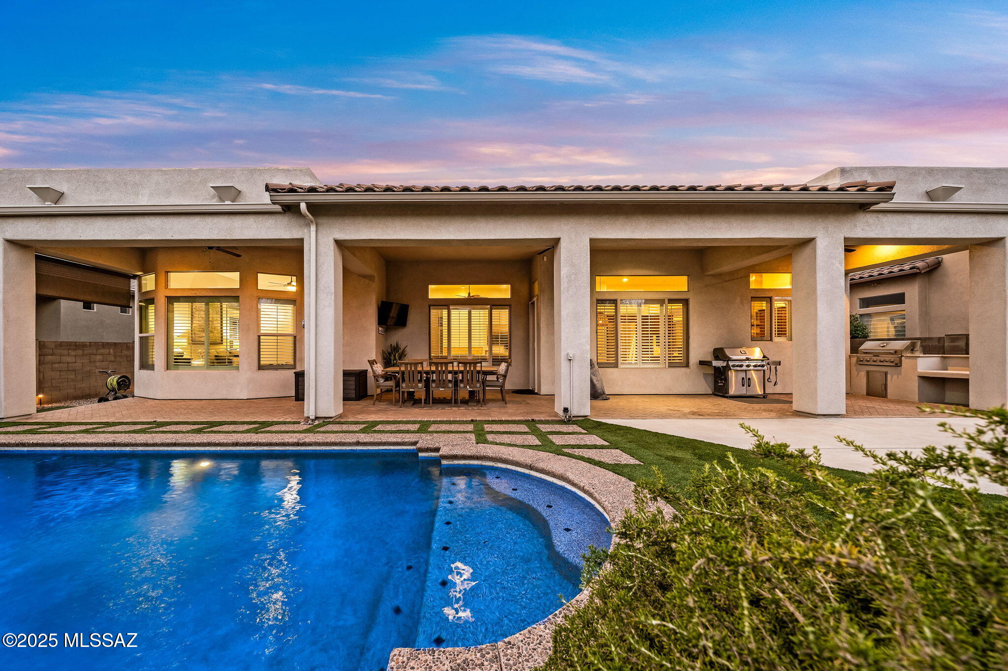 *** 3.25% Assumable Loan open to NON Veterans & Vets!!!  Welcome to your stylish new home in the highly desirable Rancho Vistoso / Sienna gated community!  This gorgeous single story gem situated on a quiet cul-de-sac features 3,076sqft of thoughtfully designed living space, featuring 4bds, 3.5bath, 3car extended garage, & soaring 12' ceilings. Enjoy an open flr plan w/ effortless flow between the living, dining & kitchen. The kitchen is a dream w/ SS appliances, gas stove & large island for all your culinary adventures. Step outside to your private backyard oasis, the covered patio & pool w/fountains is perfect for hot AZ days, surrounded by mature landscaping & fruit-bearing trees.