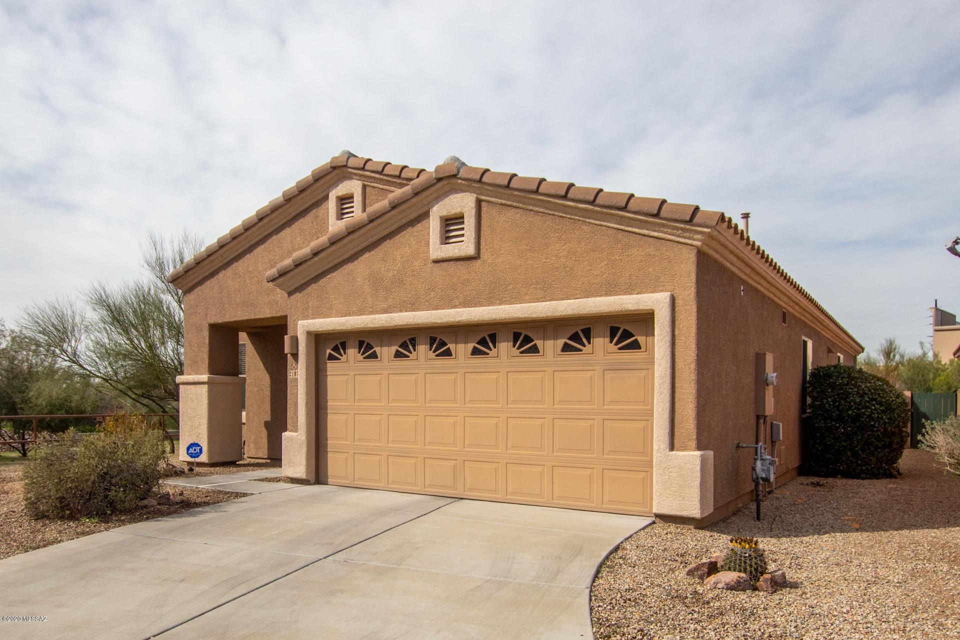 Beautiful 4 bedroom, 2 bathroom Oro Valley home with incredible Catalina Mountain views available in highly sought after Rams Pass. Excellent community, nestled just off of Oracle Rd for easy access to shopping, dining and entertainment. Inside is bright and very well maintained. The spacious, open floorplan is perfect for entertaining. Kitchen will delight any chef with granite countertops, high end ss appliances and overlooks the living and dining area with a breakfast bar. Low maintenance tile and light carpet in all of the right places. Neutral paint tones throughout. Master bedroom includes a private en-suite. Inviting backyard is complete with a covered patio, a perfect spot to relax and enjoy a book or beverage. Call for your showing today!