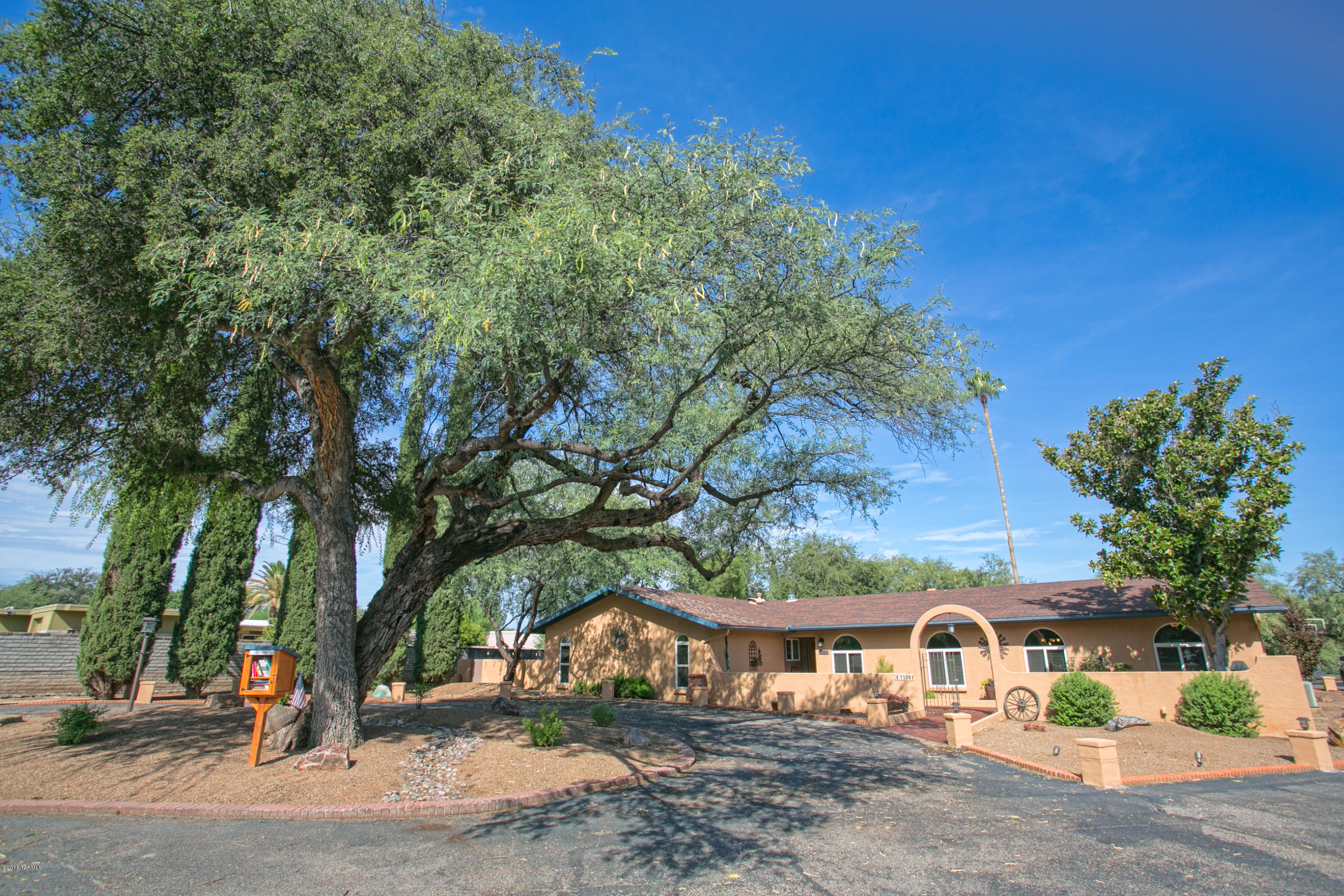Gorgeous 5BR /3BA  masonry constructed home that has been lovingly updated and boast guest quarters or rec room so your family can live comfortably. Ideal multi-generation home, this property truly has something for everyone! Private and serene setting on .63 of an acre lot at the end of a cul de sac nestled by mesquite tree with open space behind you. Backyard is a lush paradise with sparkling pool and sprawling patios. Inviting courtyard entry with mature landscape. Functional design offers open kitchen to living room with stacked stone fireplace that exudes a warm ambiance. Large family room opens to dining room which encourages conversations. Gracious room sizes. Oversized 3 car garage with storage room. Abundance of natural light throughout with french doors, windows and solar tubes.