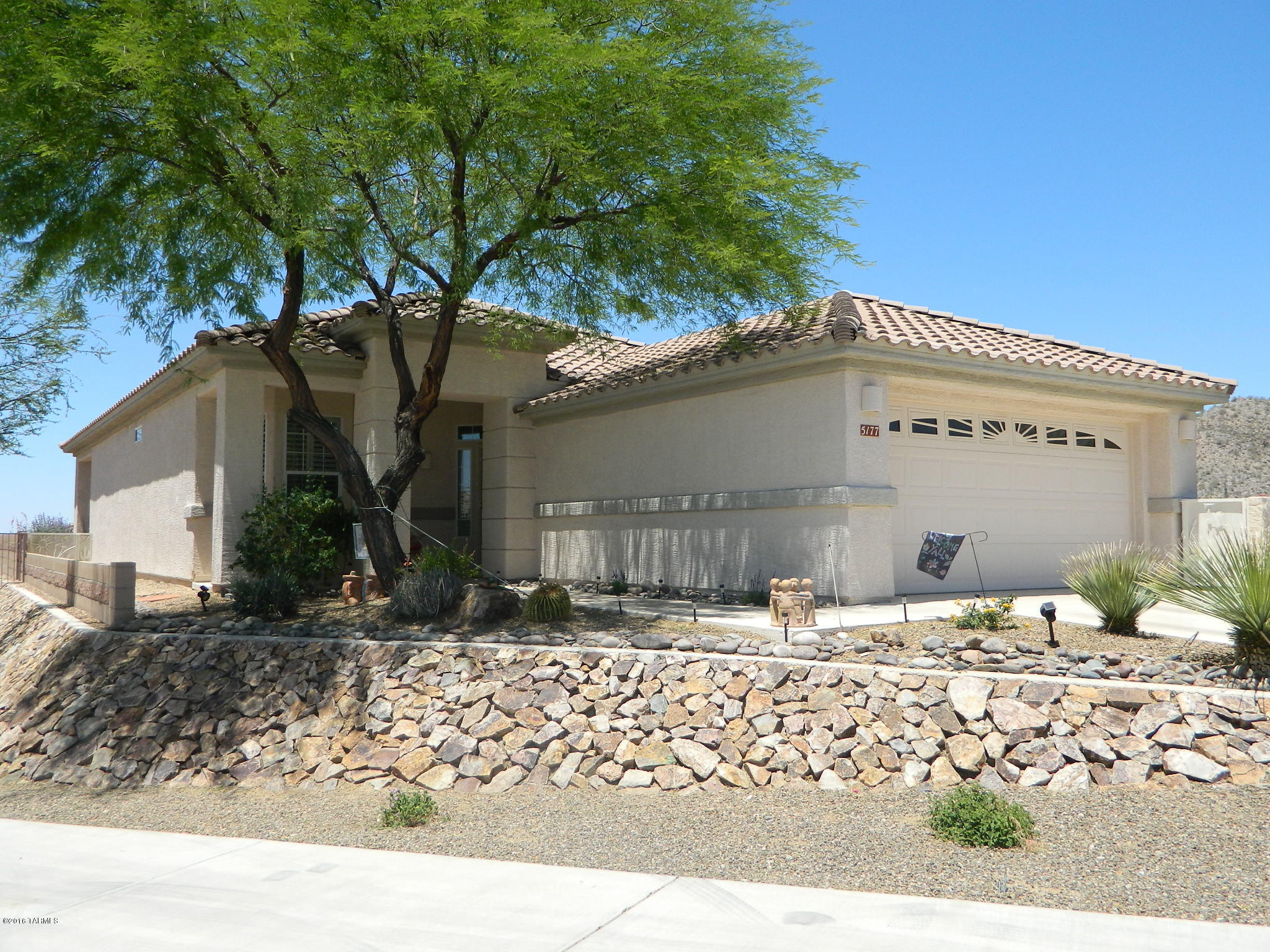 VIEWS-City-Mountains-Sunset we have it all! These are MUST SEE views, camera does not do it justice. The popular Aurora plan with beautiful plantation shutters throughout, storage cabinets in garage, extra large laundry room with more storage. Outside enjoy the extended patio with fire pit and gentle breezes off the Tortolita Mountains. Seller is a licensed real estate agent in Arizona