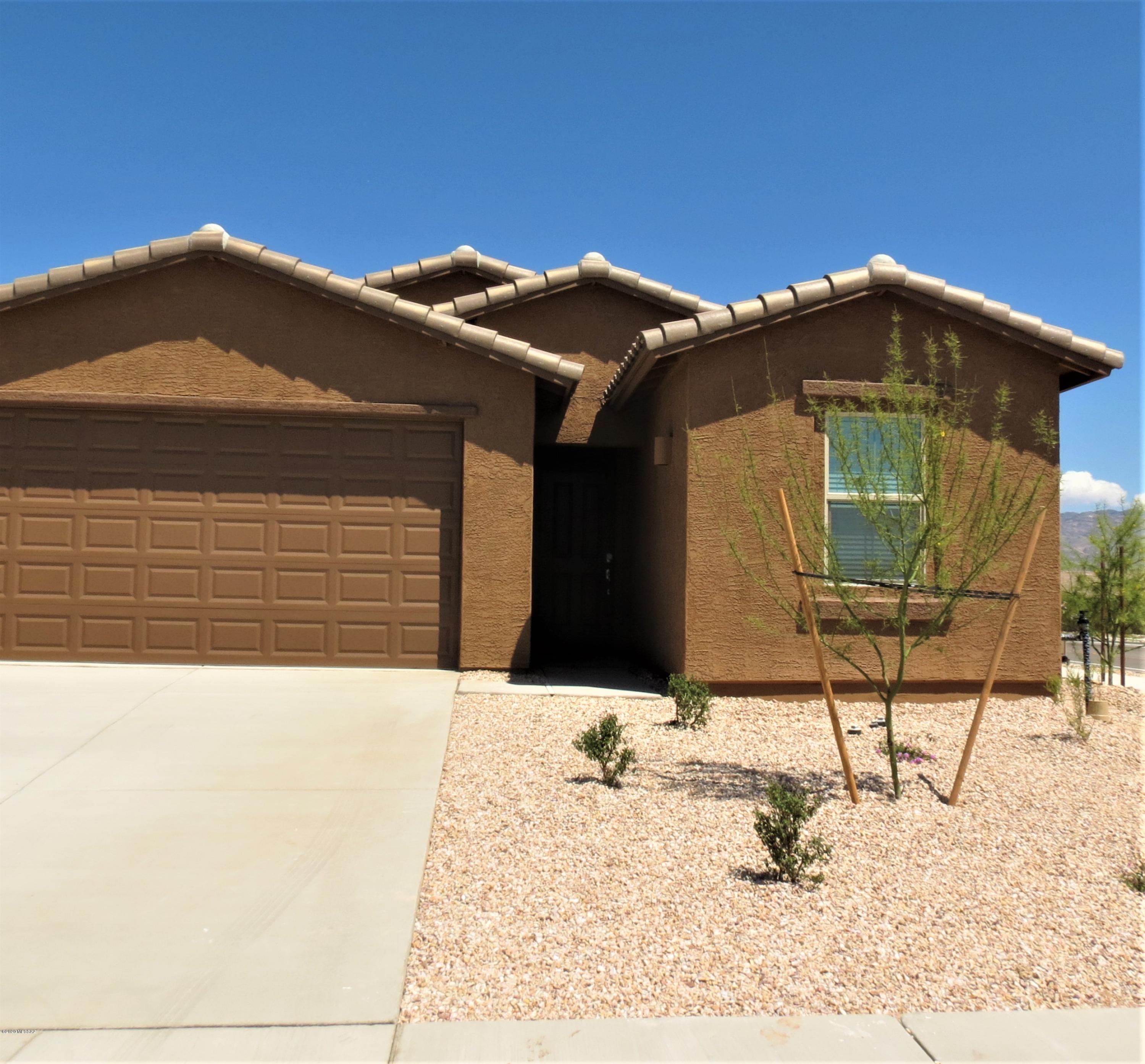 Brand New 5 bedroom 3 bath home, this home has so many upgrades and neutral colors throughout. This very spacious great room floor plan has 18' tile in all the right places, carpet in bedrooms, kitchen has granite counter and 48' upper cabinets for plenty of storage, large master bedroom suite with dual sinks and walk-in shower, Wi-Fi certified home with ring door bell, prep for reverse osmosis and soft water loop prep, blinds on all windows, covered patio with mountain views. This home is clean and ready Now!